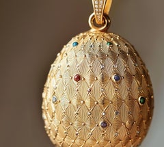 Eighteen Karat Yellow Gold Easter Pendant with Sapphires and Diamonds