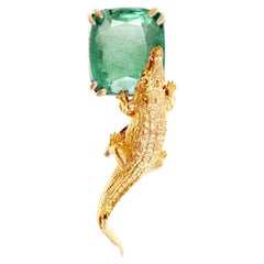 Eighteen Karat Yellow Gold Egyptian Revival Brooch with Three Carats Emerald