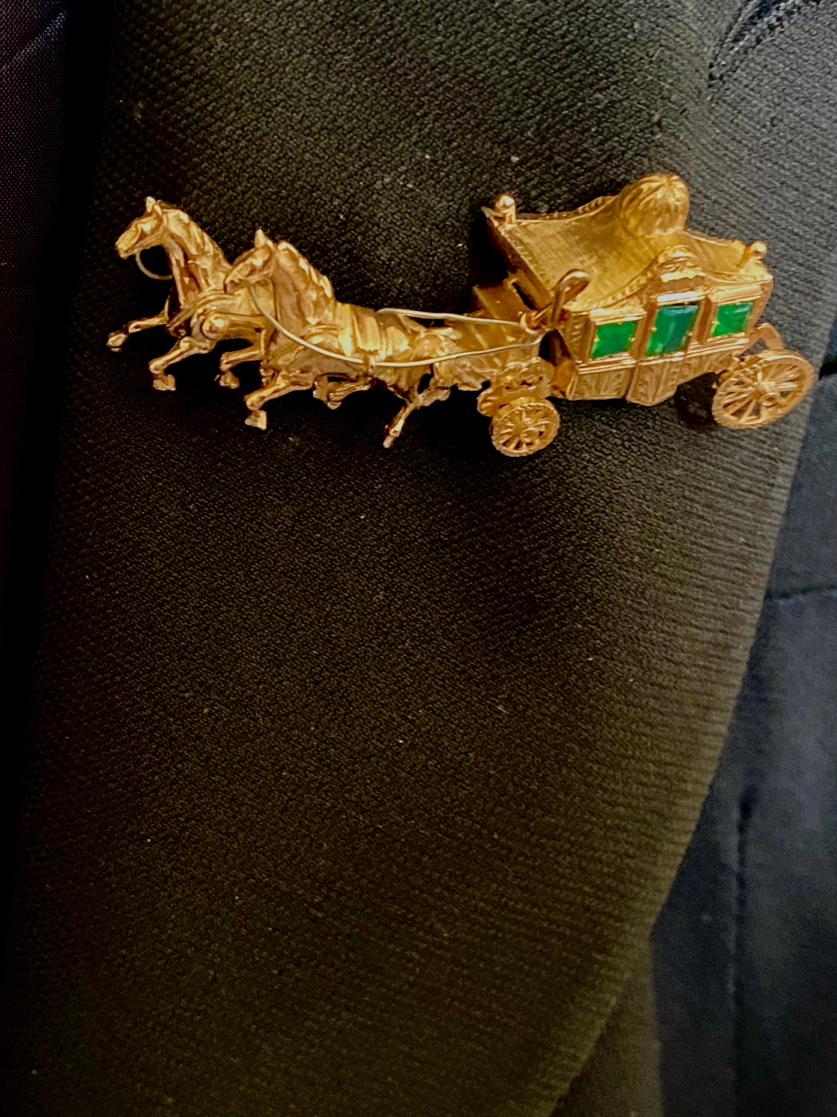 Women's or Men's Eighteen Karat Yellow Gold Horse Drawn Carriage Brooch Three Green faceted Gems