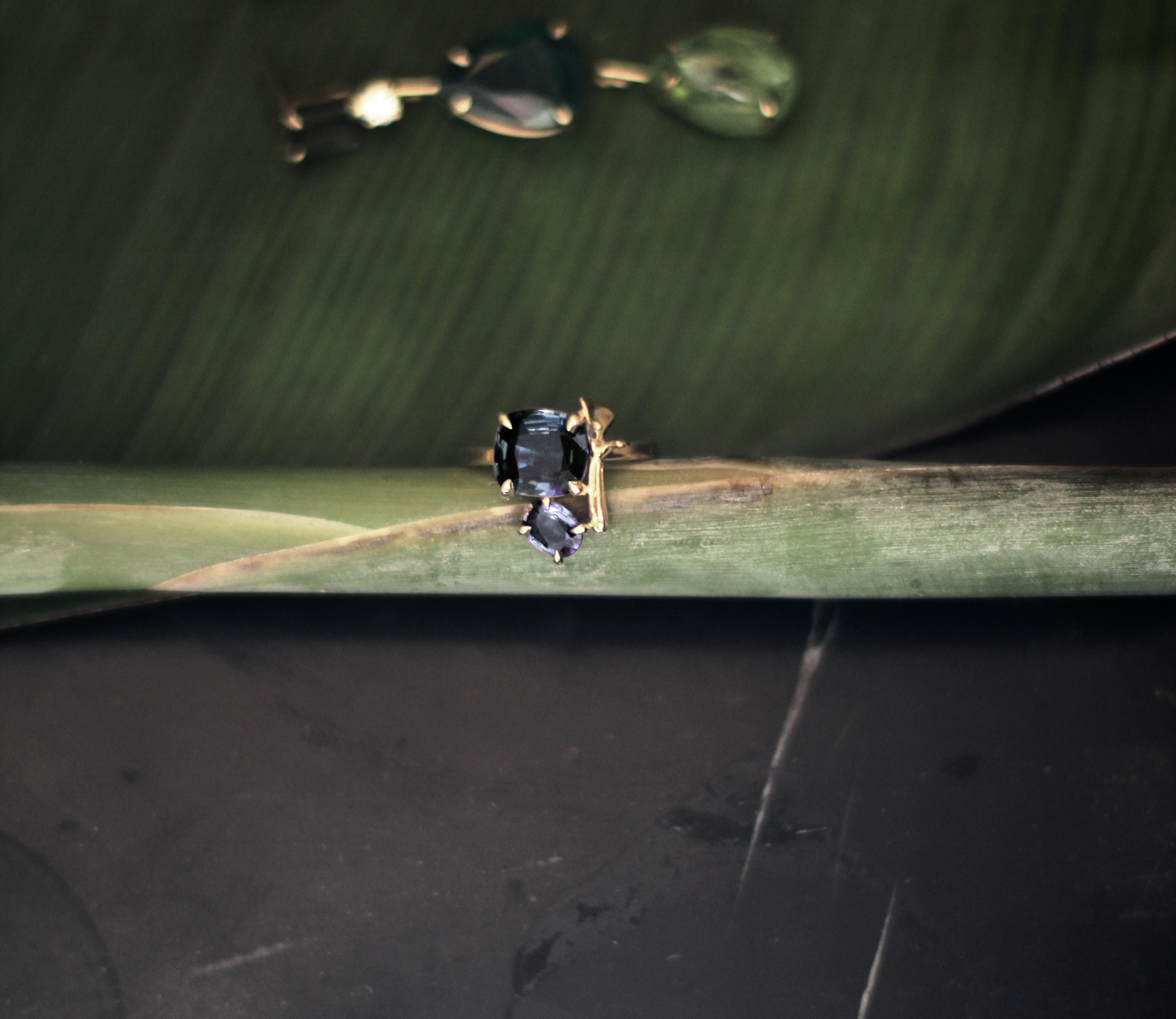 Antique Cushion Cut Eighteen Karat Yellow Gold Lavender Contemporary Ring with Iolites For Sale