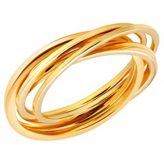 Eighteen Karat Yellow Gold Six Solid Rolling Rings
