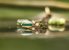 Boucles d'oreilles pendantes en or jaune 18 carats avec péridots et topazes