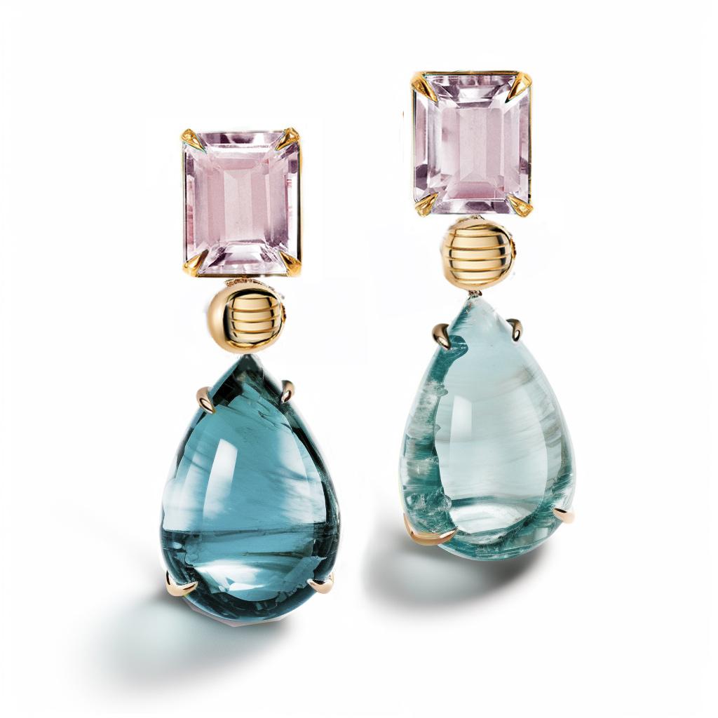 These contemporary stud drop earrings are made of 18 karat yellow gold with natural cabochon beryls and rose quartzes. We work with german gems company, that is in the market since the 19th century. It has a crocodile detail on the side of one
