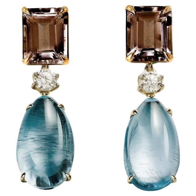 Pendientes de oro amarillo de dieciocho quilates con zafiros y cuarzos ahumados