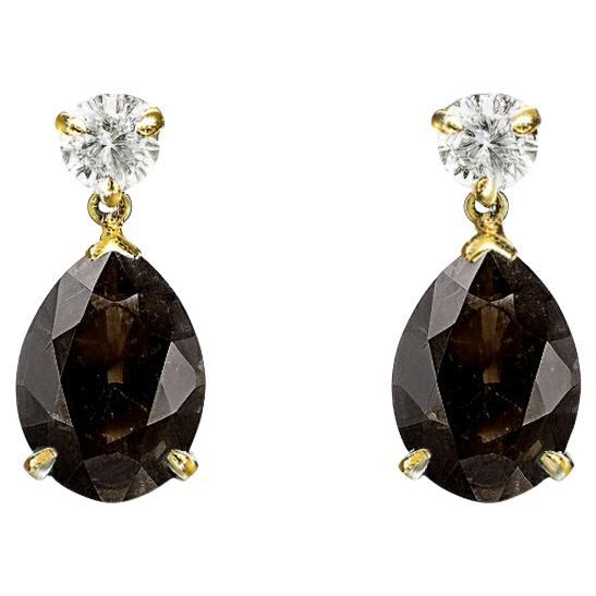 Pendientes de oro amarillo de dieciocho quilates con zafiros y cuarzos ahumados en venta