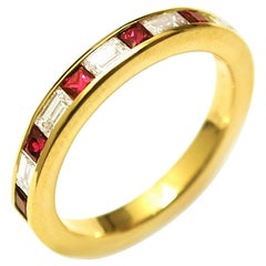 Eighteen Karats Gold Baguette Diamond Alternating Princess Ruby Partial Band