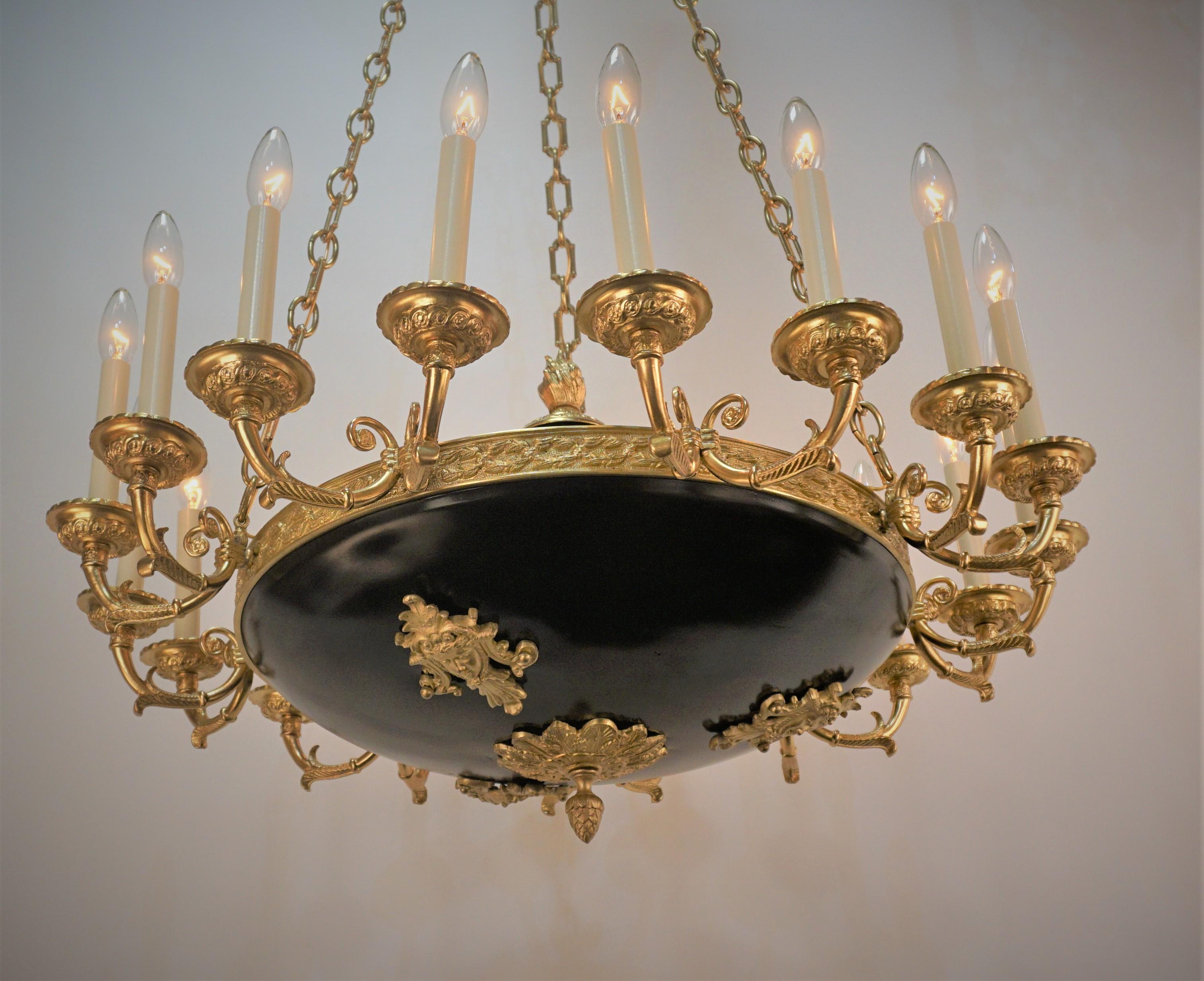 French large bronze eighteen light chandelier with black lacquered center part. 
Professionally rewired and ready for installation.
Height can be adjusted by removing some of the chain.