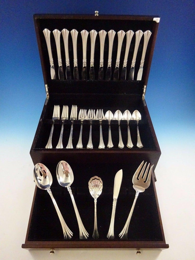 18th century by Reed and Barton sterling silver flatware set - 53 pieces. This set includes:

12 knives, 9