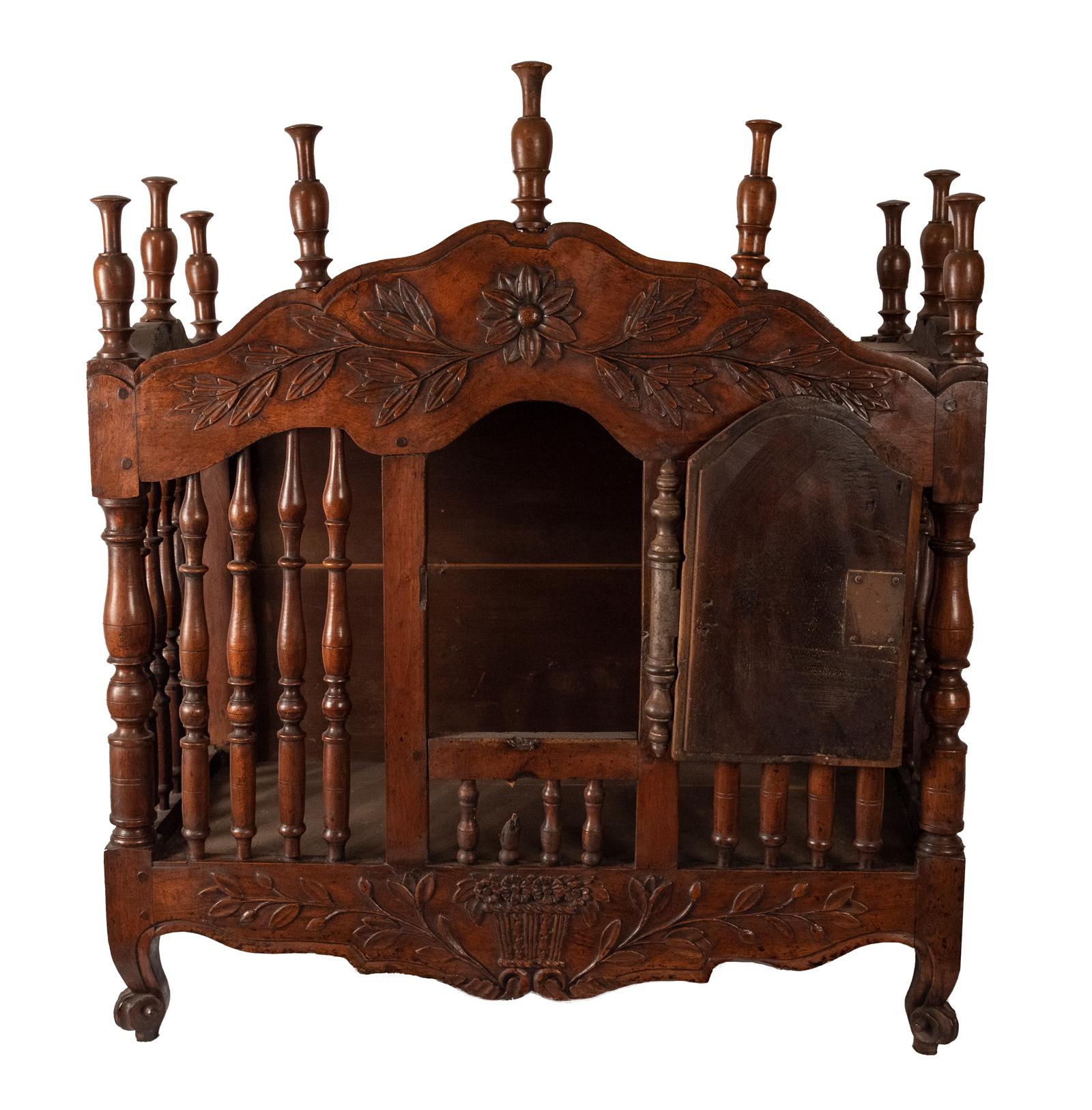 With wrought iron mounts and carved with sheaves of wheat, circa 1780.