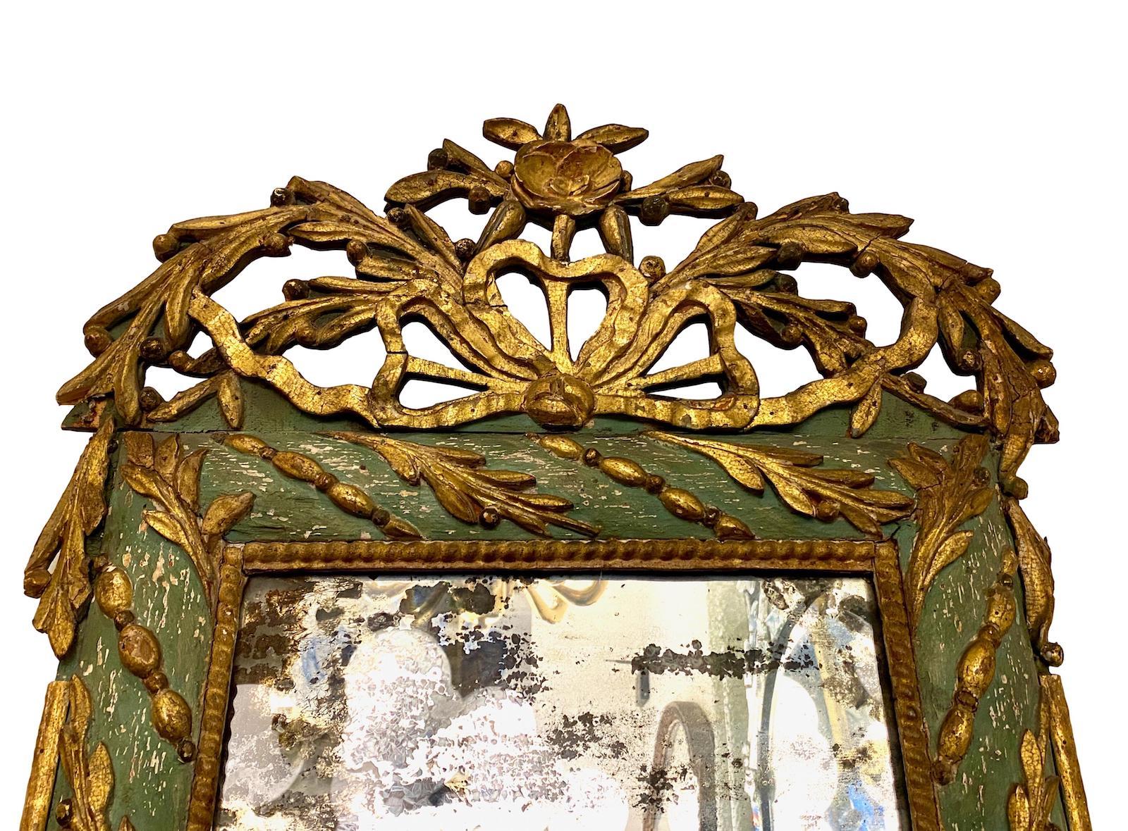 Antique late 1800s French neoclassic style carved and painted wood mirror with gilt details. 

Measurements:
Height 41?
Width 23?.