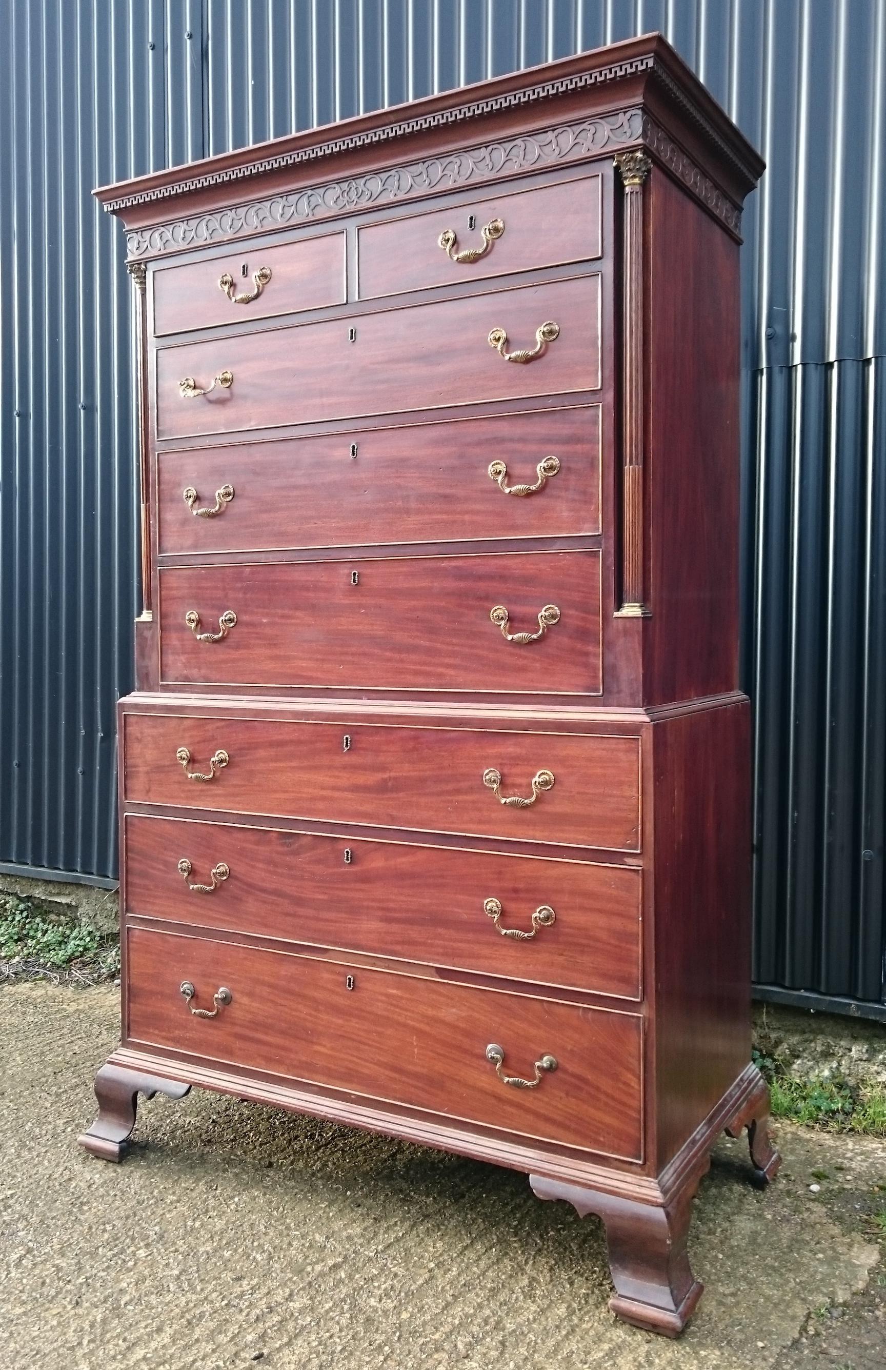 18th century George III period antique mahogany chest on chest. This is a great chest on chest with some lovely details. The ogee bracket feet are a generous shape, the pillasters have fluting and gilt brass capitals, the handles still have traces