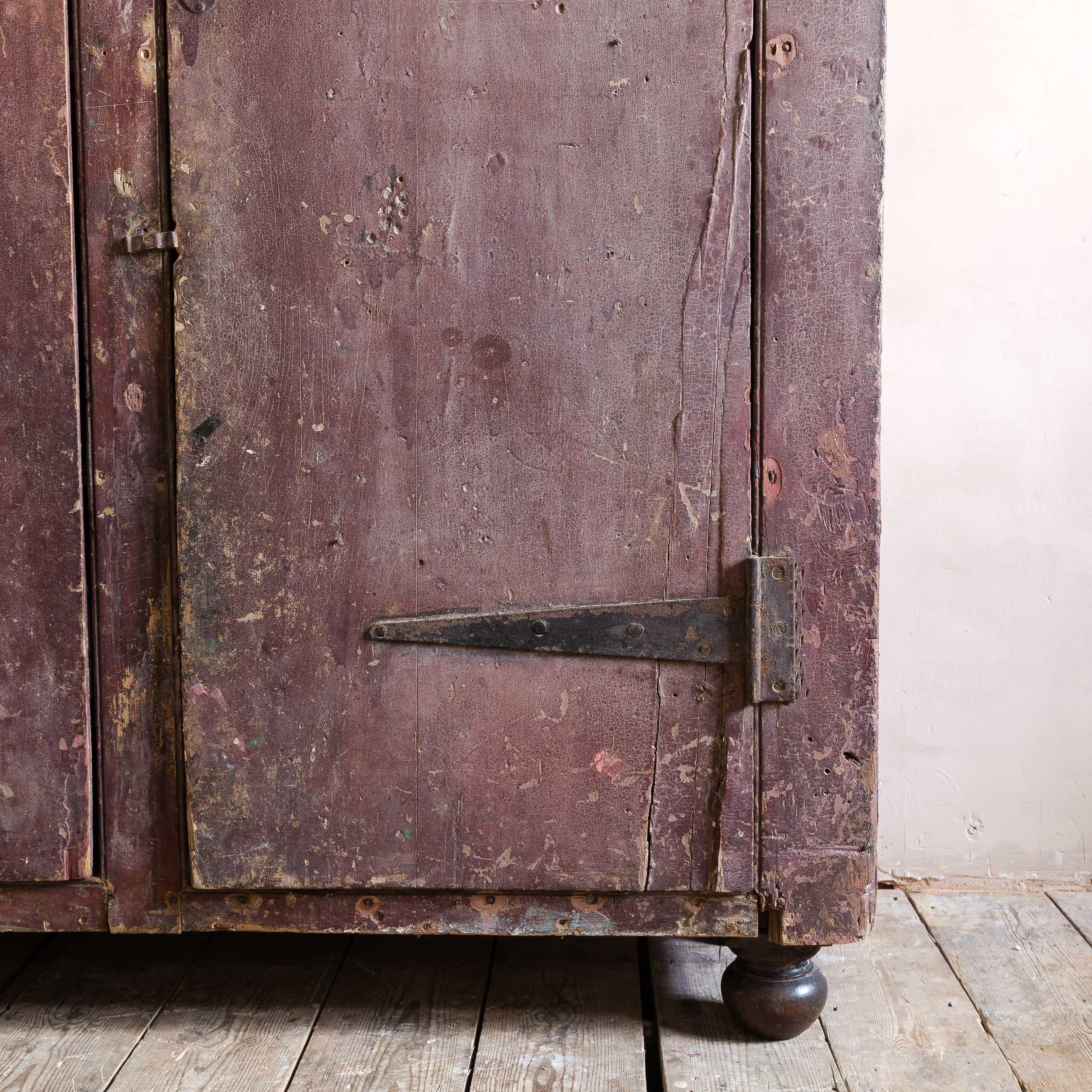 Eighteenth Century Painted Cupboard With Richly Patinated Surface In Distressed Condition For Sale In London, GB