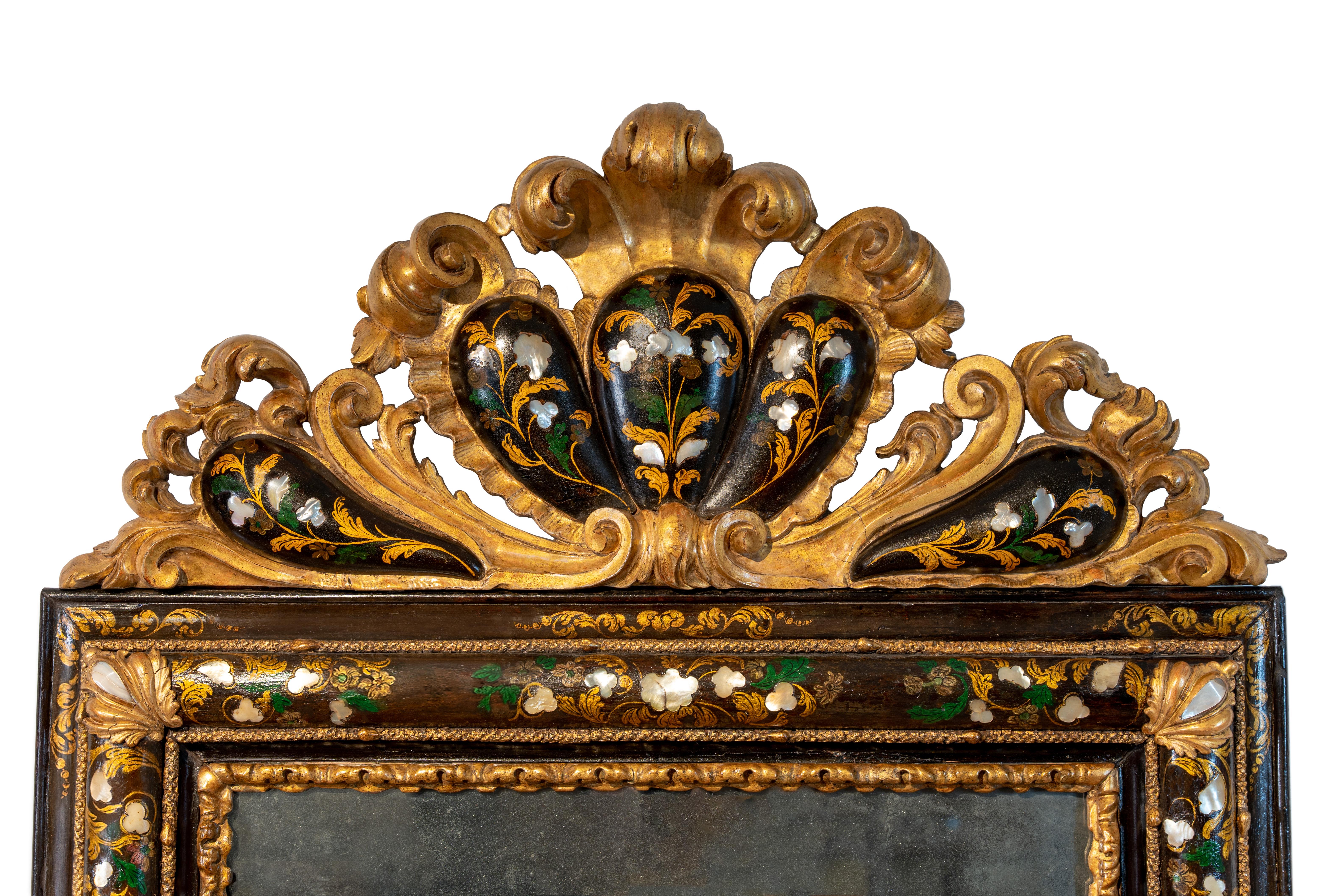 Louis XIV Eighteenth-century Venetian mirror in lacquered wood and with mother-of-pearl in For Sale