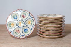 Eight French Quimper 19th Century HB Manufacture Oyster Plates with Floral Motif
