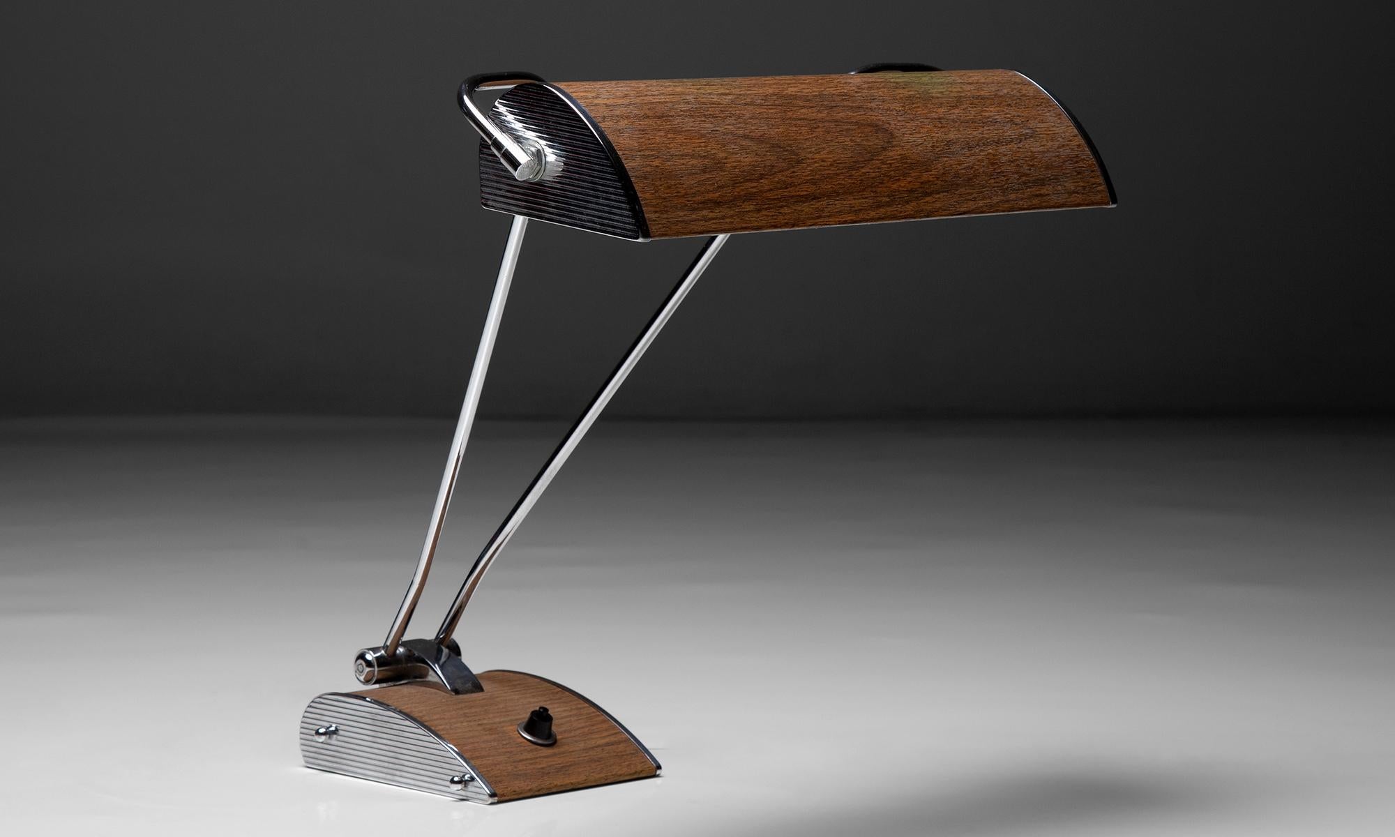 Eileen Gray Desk Lamp

France circa 1950

Chromed metal with wood veneer.

14.25”w x 11.5”d x 16.25”h