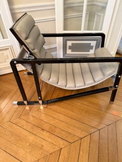 Eileen GRAY & ECART INTERNATIONAL (publisher) Pair of “Transat” armchairs