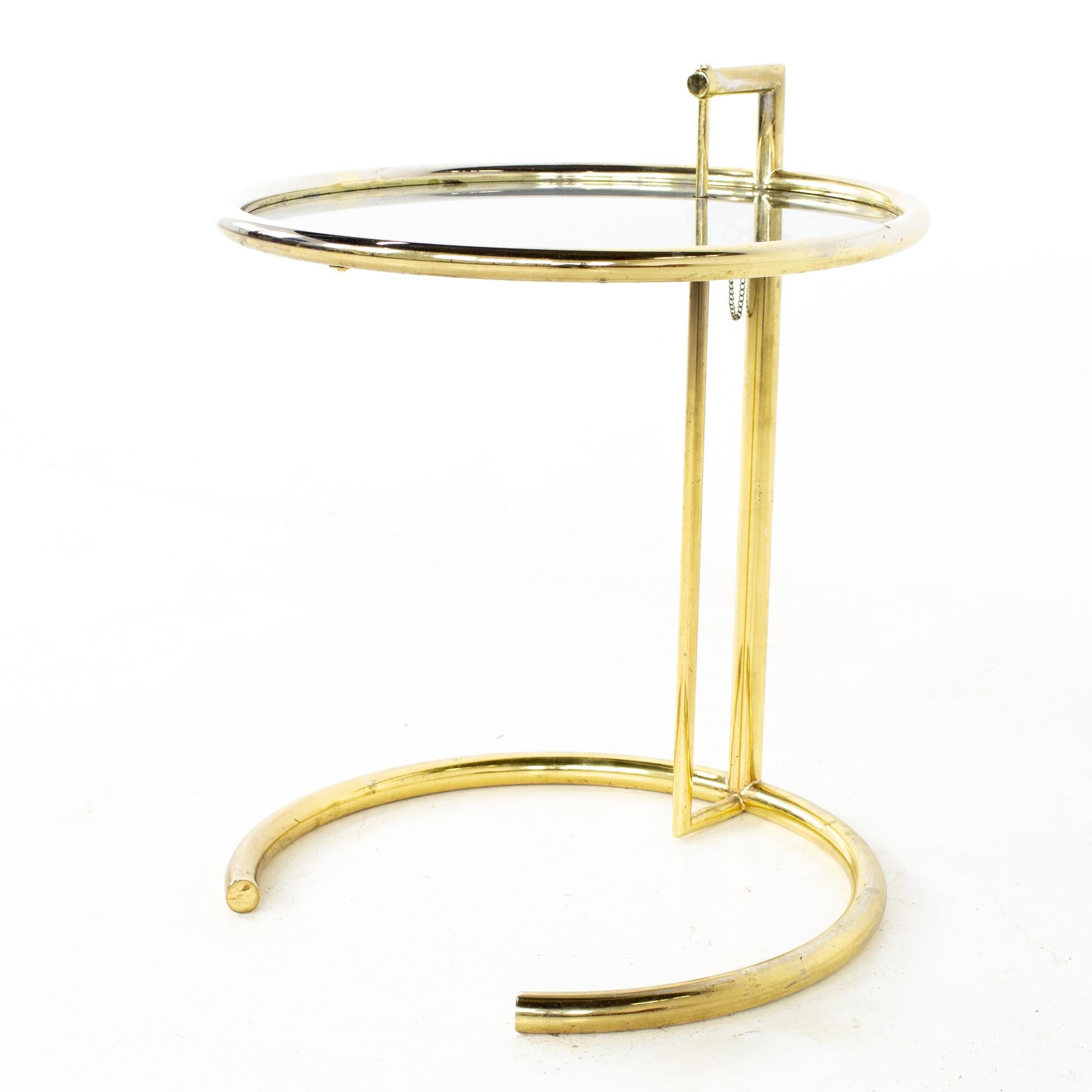 Eileen gray mid century brass adjustable side end table
Table measures: 20.25 wide x 20.25 deep x 24.5 inches high

All pieces of furniture can be had in what we call restored vintage condition. That means the piece is restored upon purchase so
