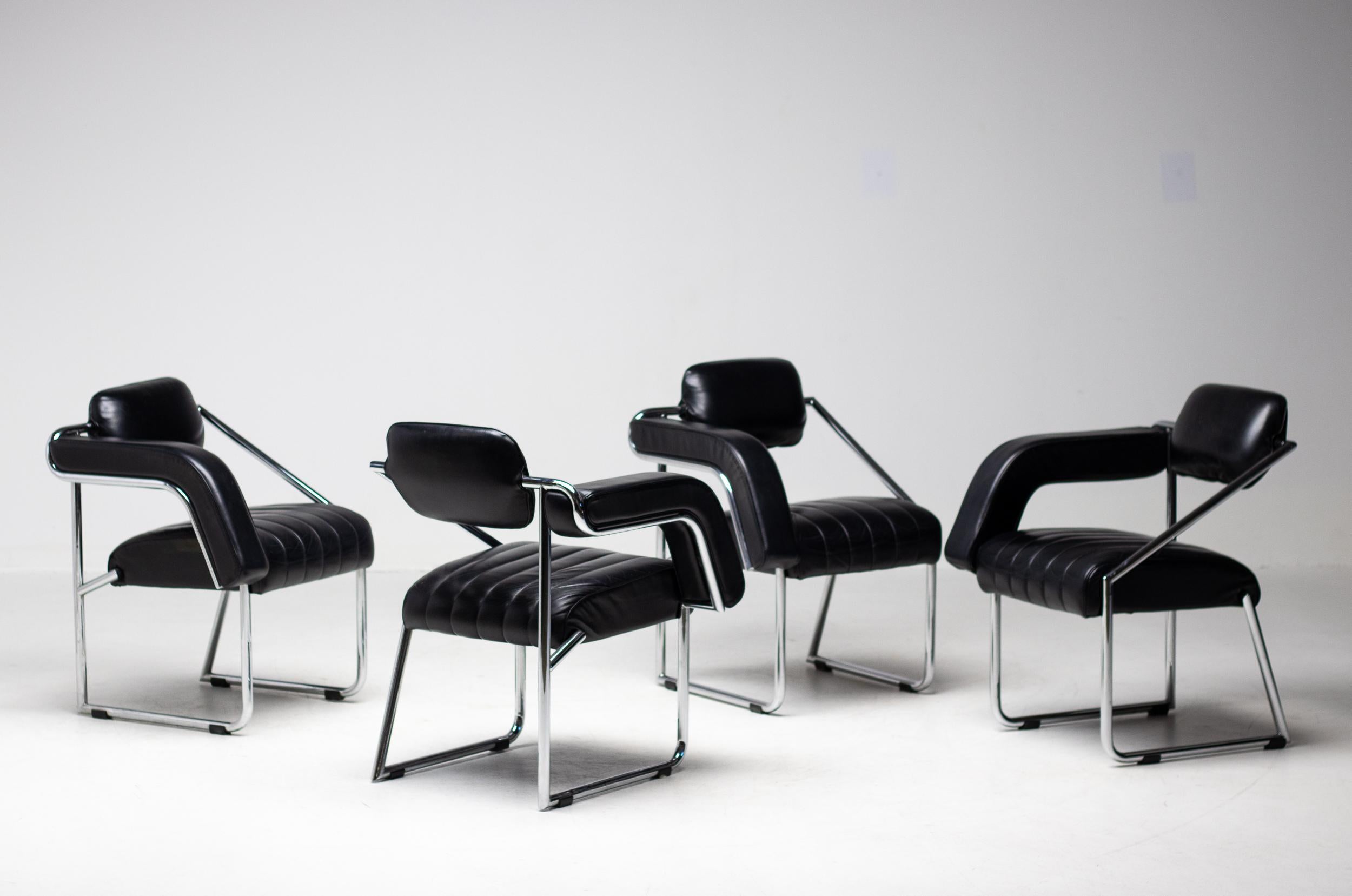 Unique set of 4 Non Conformist chairs made circa 1970 by Ecart International.
The underlying theme of the Non Conformist chair, by Irish designer Eileen Gray (1878–1976), is comfort. 
Its tubular frame was designed ergonomically, as Gray understood