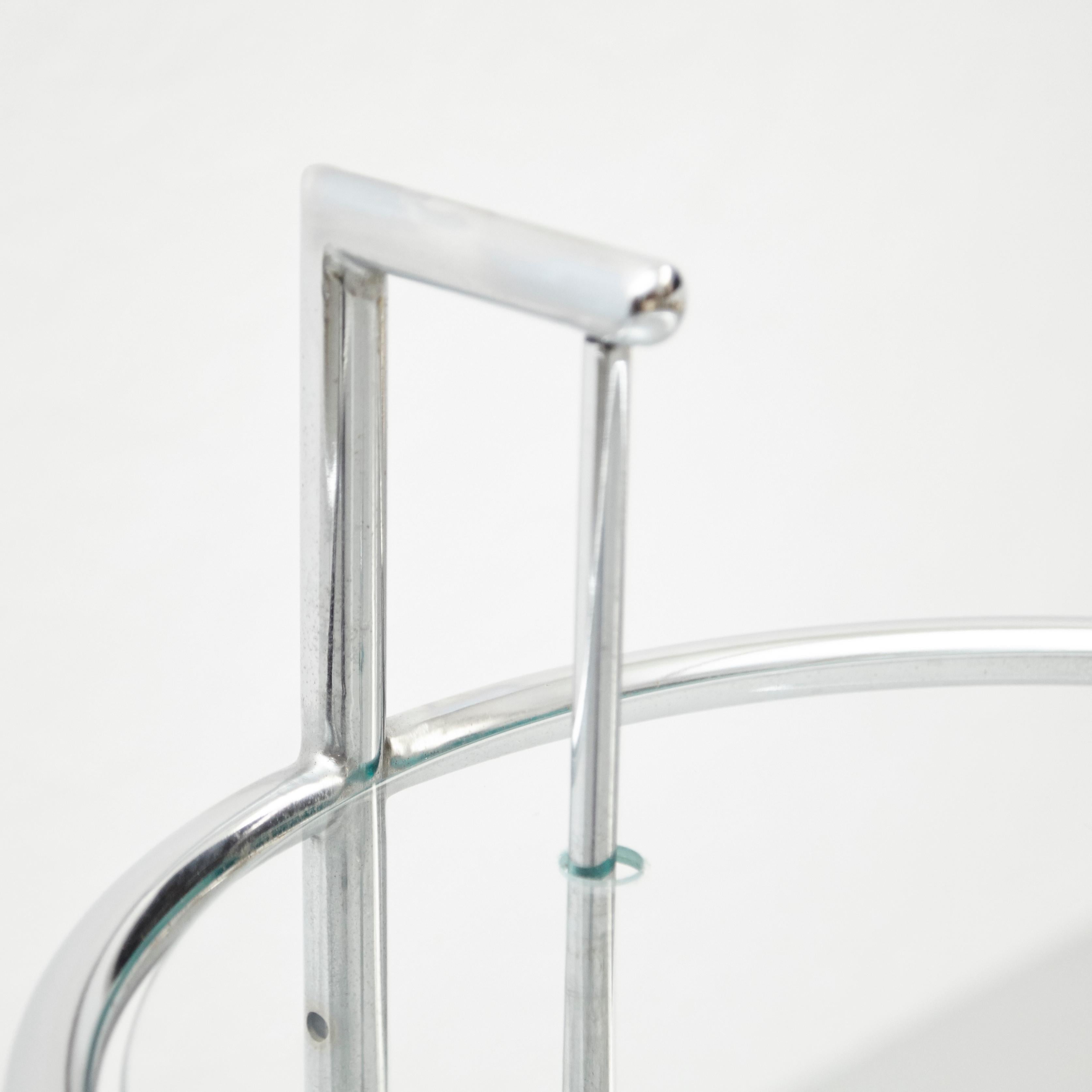After Eileen Gray Pair of E1027 Side Tables, Glass and Tubular Steel, circa 1970 1