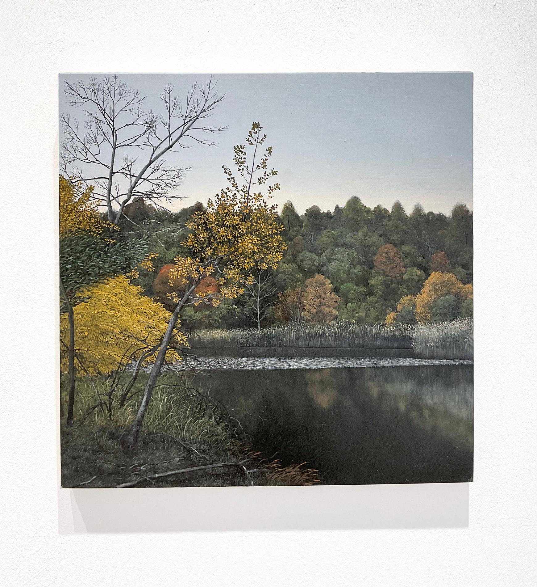 Photo-realist fall foliage landscape painting of a calm pond in the Hudson River Valley under a grey-blue sky
