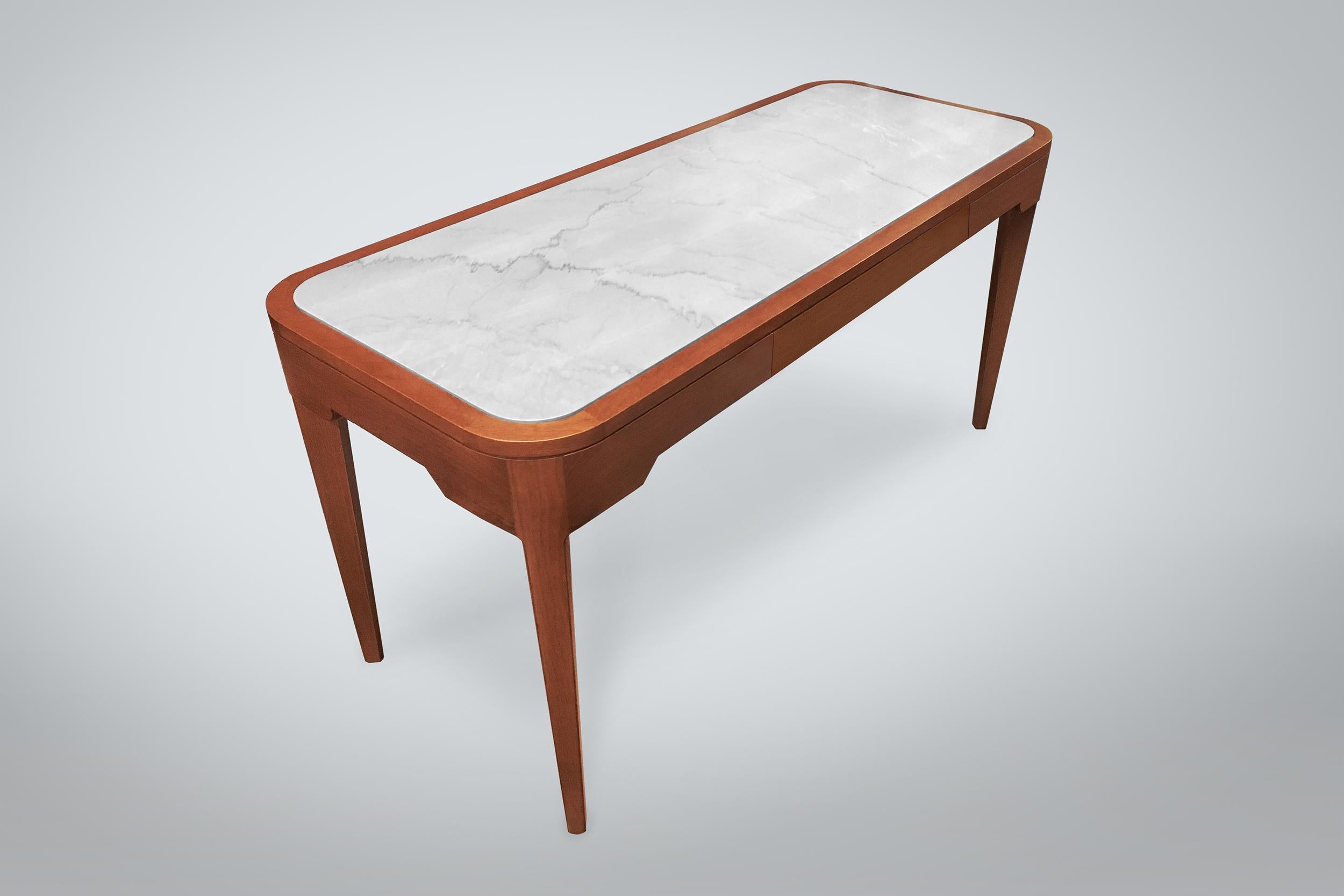 Our Eileen writing desk shown in walnut with palissandro stone inset (COM).

All of our pieces are made to order with custom sizes available upon request. Additional options include but are not limited to wood species, finish, and hardware. Inset