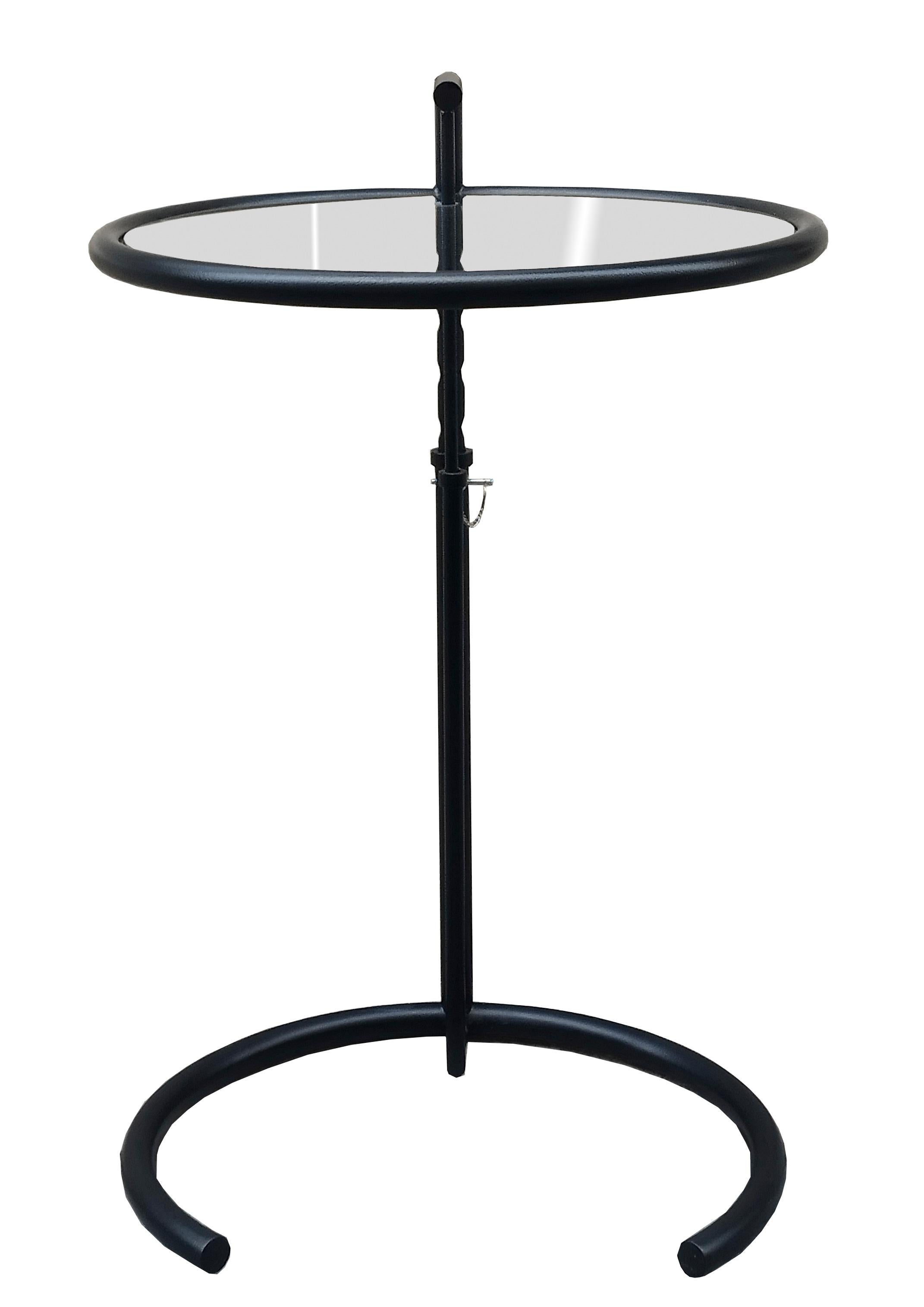 Eileen Gray E1027 black metal and smoked glass adjustable coffee table. This model is officially licensed by Aram Design Ltd. and manufactured by ClassiCon in Italy.