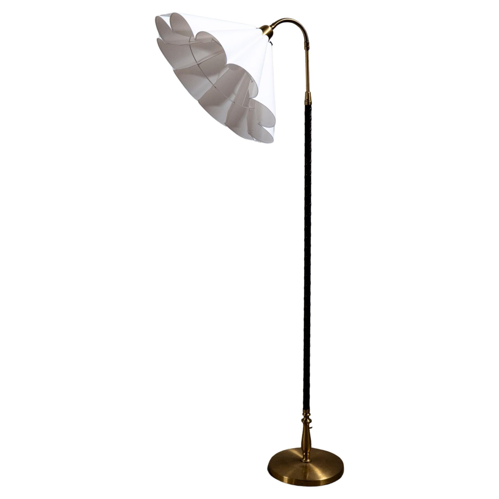 Einar Bäckström Model "7402" Brass and Leather Floor Lamp, 1950s Sweden