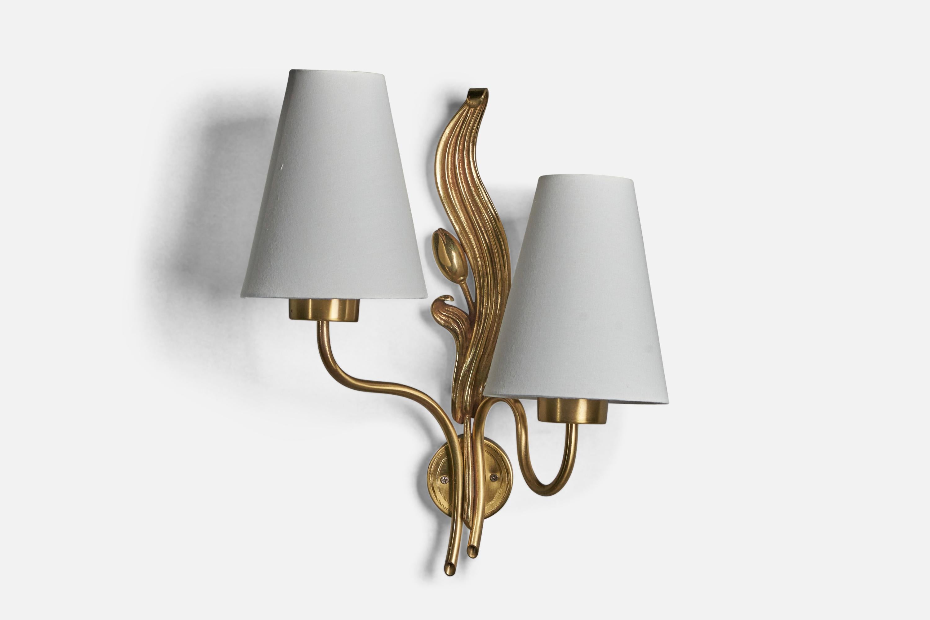 An organic two-armed brass and white fabric wall light designed and produced in Sweden, 1940s.

An organic two-armed brass and white fabric wall light designed and produced in Sweden, 1940s.

Overall Dimensions (inches): 16” H x 12.75” W x 7”