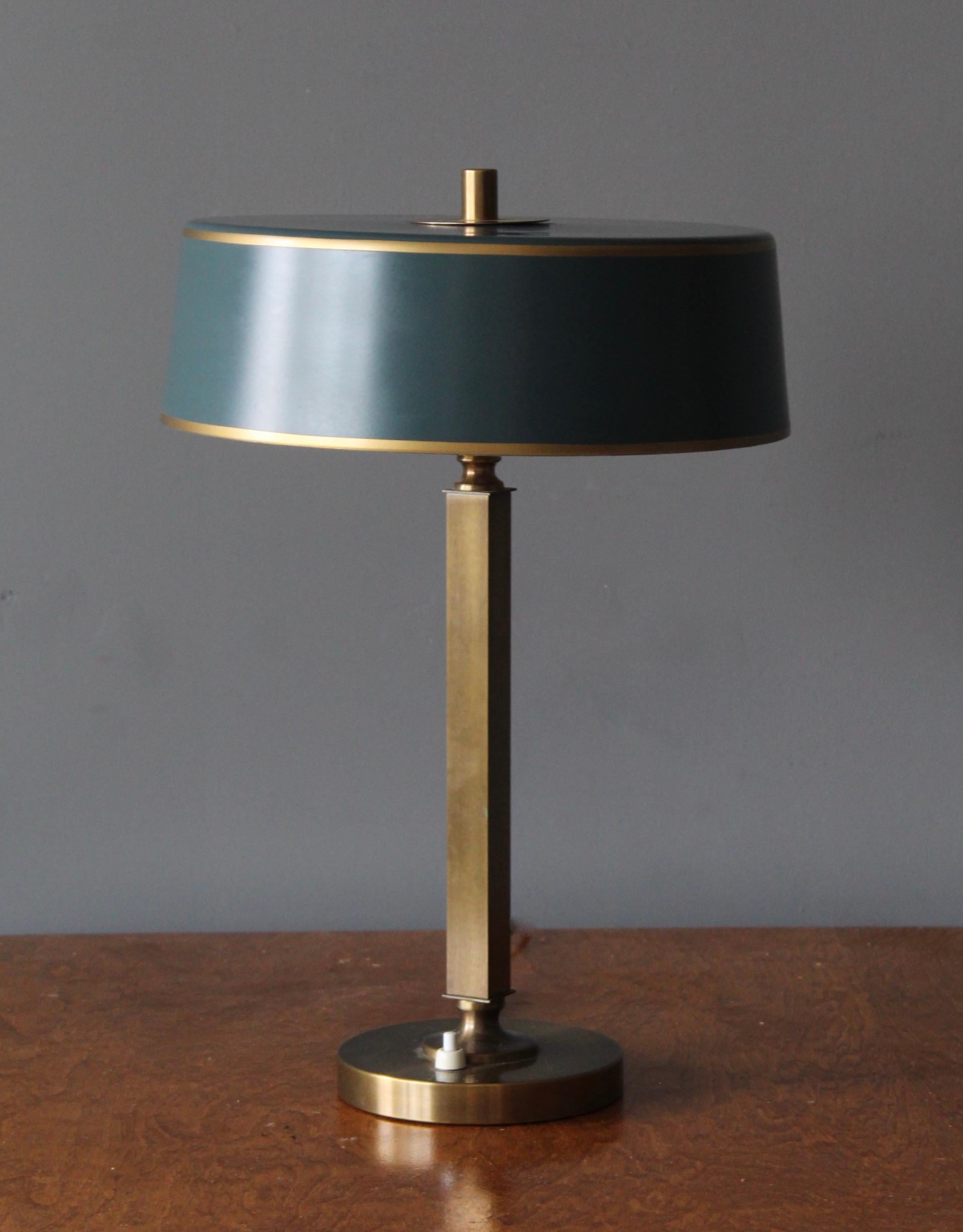 A table lamp. In brass, green lacquered metal lampshade.

Other designers of the period include Paavo Tynell, Josef Frank, Carl-Axel Acking, Alvar Aalto, and Bertil Brisborg.