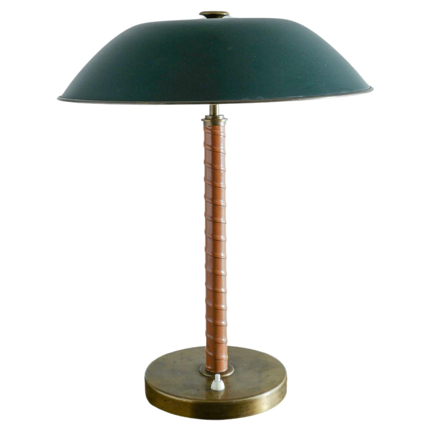 Einar Bäckström Table Lamp in Brass and Leather with a Dark Green Shade, 1940s