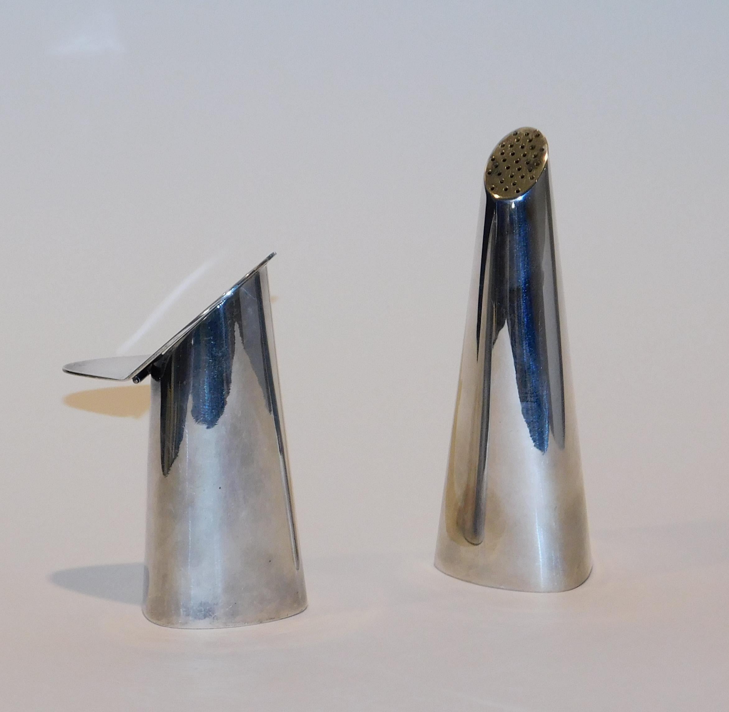 Rare E. Dragsted Set. Modernist Salt, Pepper and Creamer of sterling silver. 
Danish design, mid-20th century. Stamped.

You are buying a sterling salt and creamer by Einar Dragsted - Denmark.		
We are throwing in the Dragsted sterling pepper pot