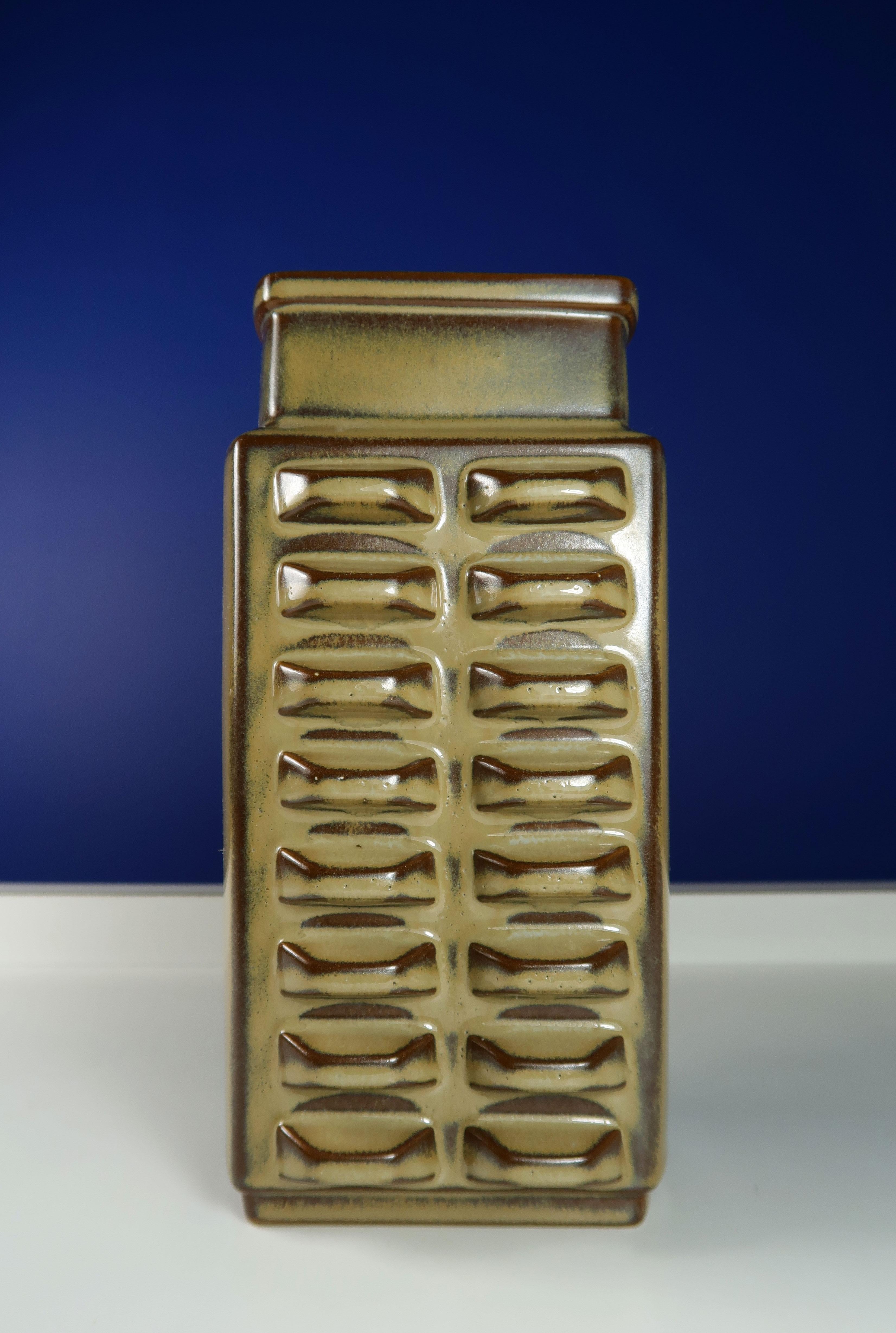Stunning rectangular Danish Mid-Century Modern vase by Einar Johansen for Søholm Keramik. Italian inspired vase with soft geometric relief pattern manufactured on the Danish island of Bornholm in the mid-1960s. Model 3405 in a rare version with warm