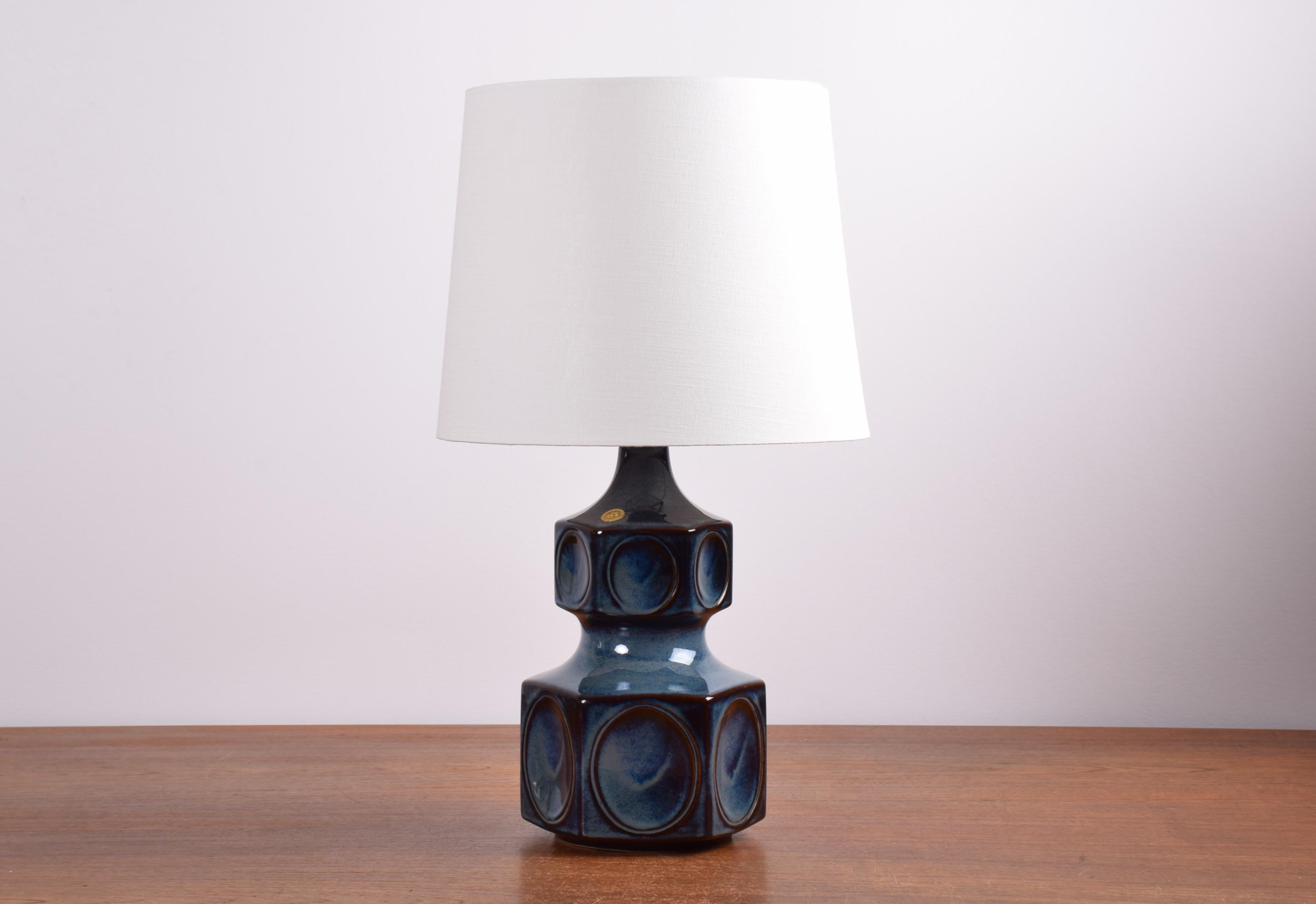 Sculptural table lamp by Einar Johansen for Søholm Stentøj, Denmark, circa 1960s.
The sculptural shape and the shiny blue glaze with brown elements gives the lamp a very vivid expression.

Included is a new lamp shade designed and made in