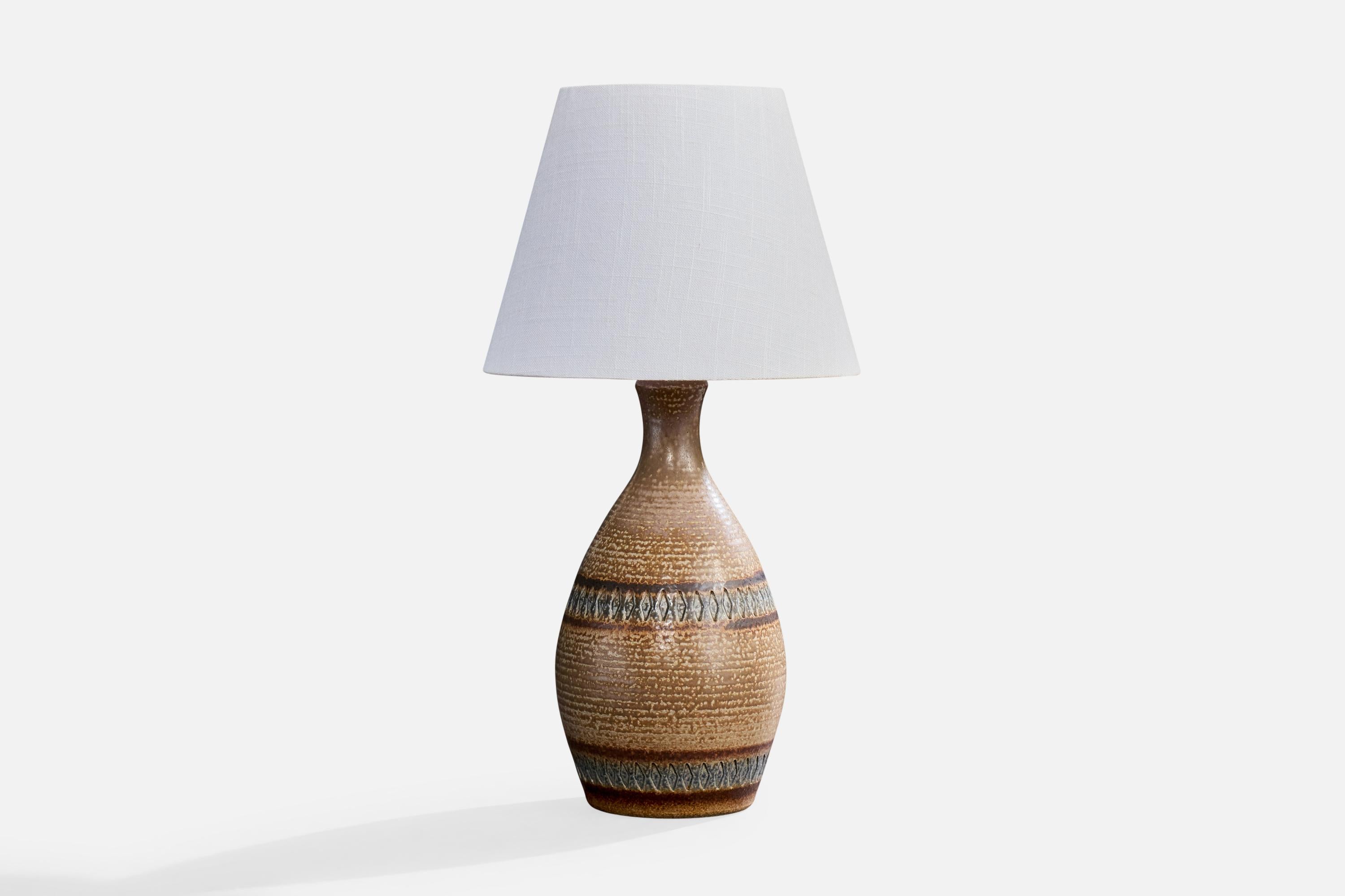 A brown and blue-glazed stoneware table lamp designed by Einar Johansen and produced by Søholm Stentøj, Bornholm, Denmark, c. 1960s.

Dimensions of Lamp (inches): 14.125