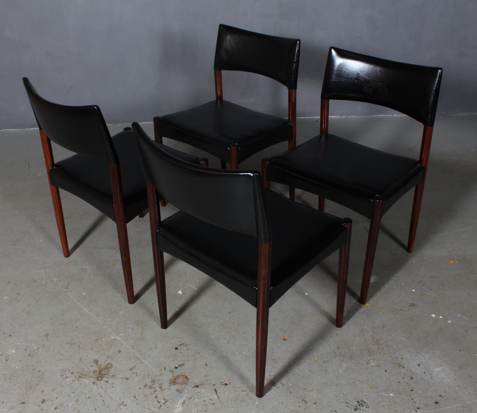 Einer Larsen & Aksel Bender Madsen dining chairs original upholstered with skai.

Frame of rosewood.

Made by Cabinetmaker Willy Beck.
