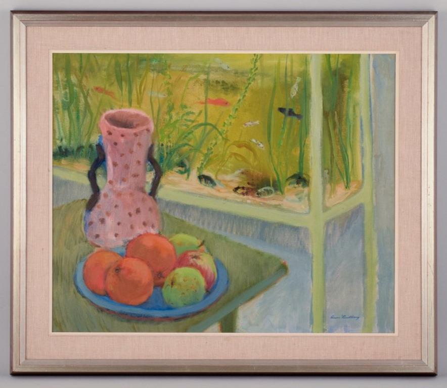 Einar Lindberg (1916-1993), listed Swedish artist. 
Oil on canvas. Still life with an aquarium, pitcher and fruits.
Modernist, colorful palette.
Approximately from the 1960s.
Signed.
In perfect condition.
Canvas dimensions: 59.5 cm x 48.5 cm.
Total