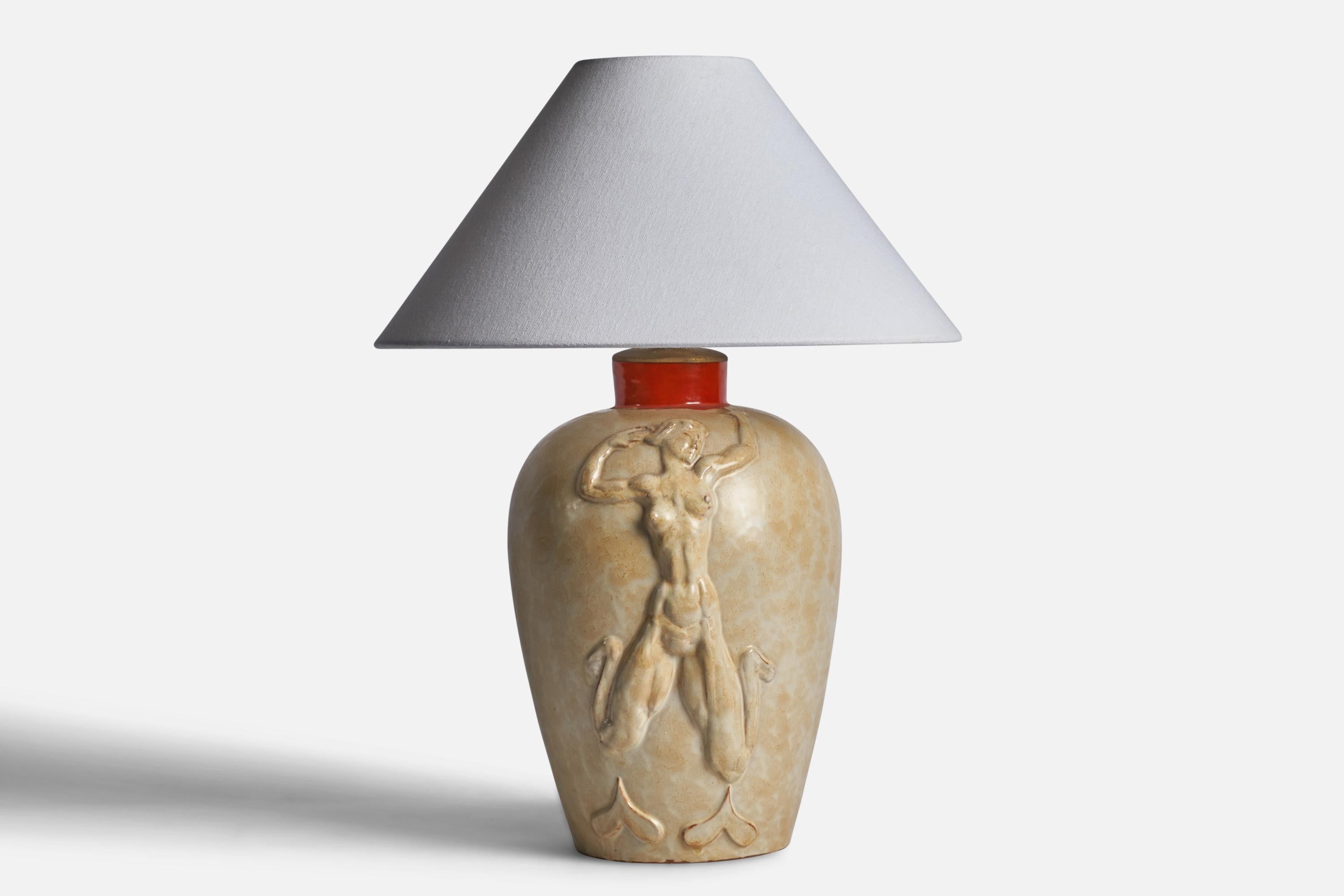A beige and orange-glazed earthenware table lamp designed by Einar Luterkort and produced by Upsala Ekeby, Sweden, 1930s.

Dimensions of Lamp (inches): 16” H x 9.5” Diameter
Dimensions of Shade (inches): 4.5” Top Diameter x 15.75” Bottom Diameter x