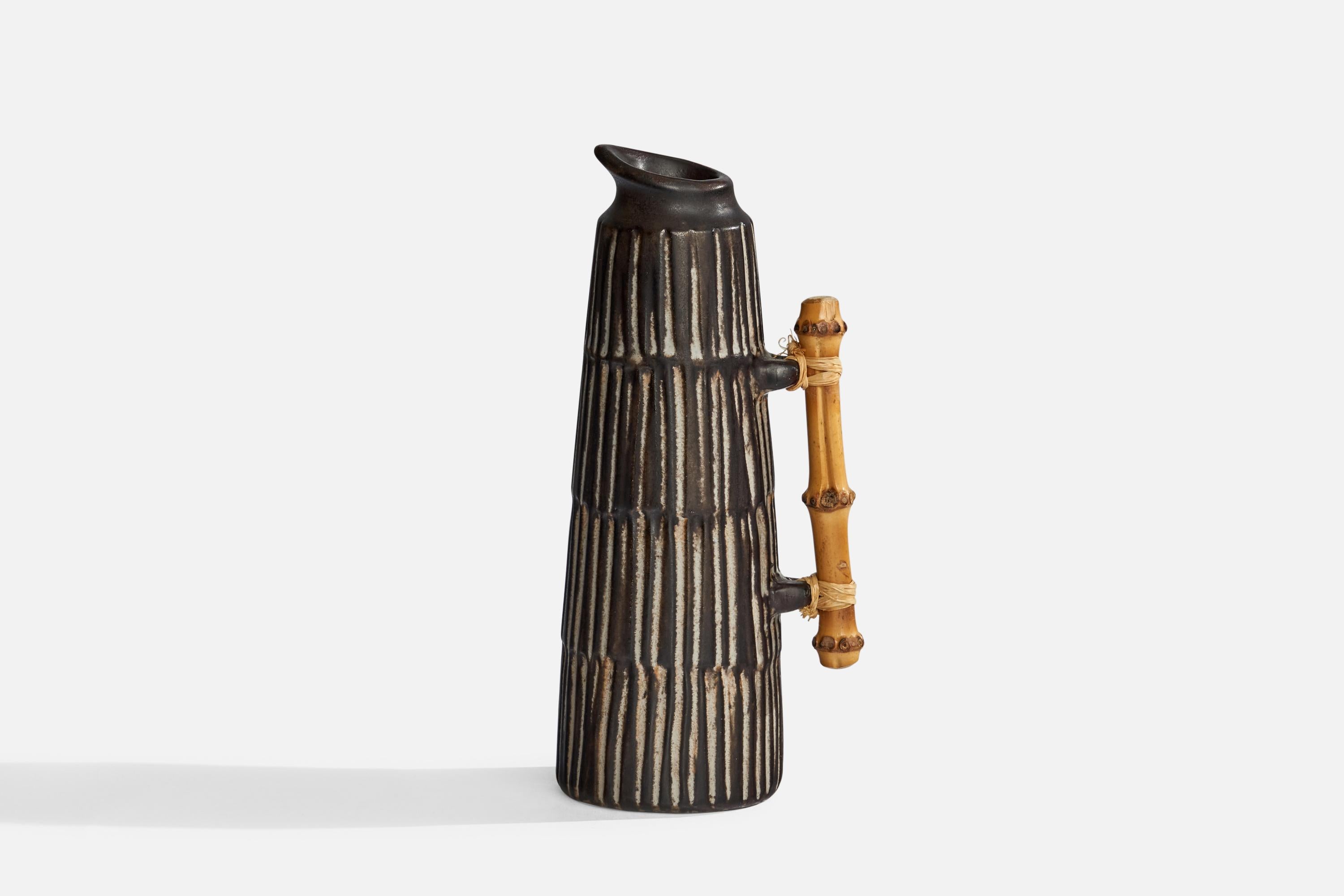 A small black grey-glazed ceramic and bamboo pitcher designed by Einer Hellerøe and produced by BR Keramik, Denmark, c. 1960s