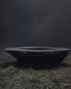 Stacked Layers Black Marble Table with Center Circular Opening by Andres Monnier