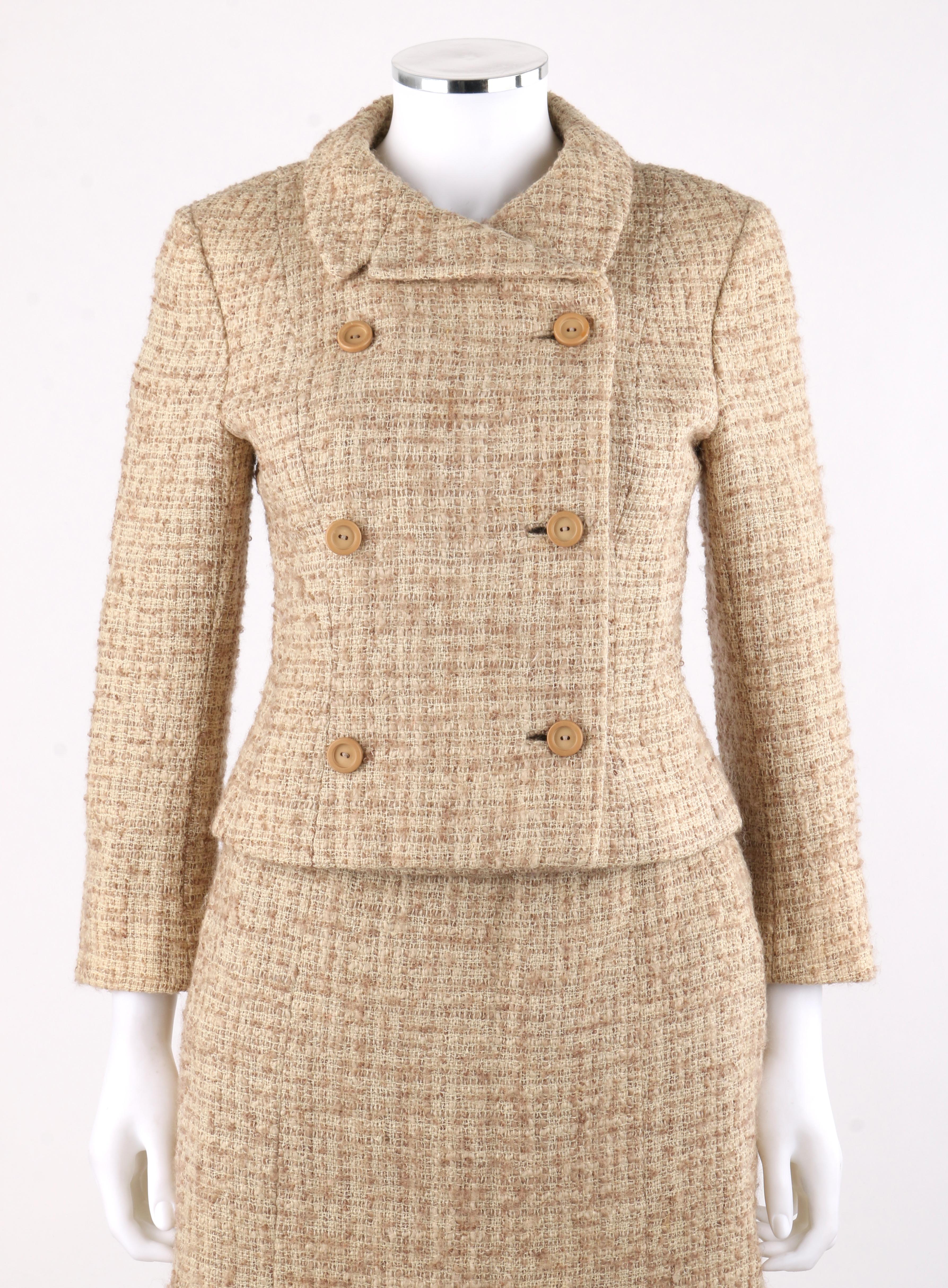 EISA c.1950’s CRISTOBAL BALENCIAGA Tweed Double Breasted Jacket Skirt Suit Set
 
Circa: 1960’s
Label(s): EISA
Designer: Cristobal Balenciaga
Style: Double-breasted cropped jacket with notched lapel and fitted sheath skirt 
Color(s): Shades of cream