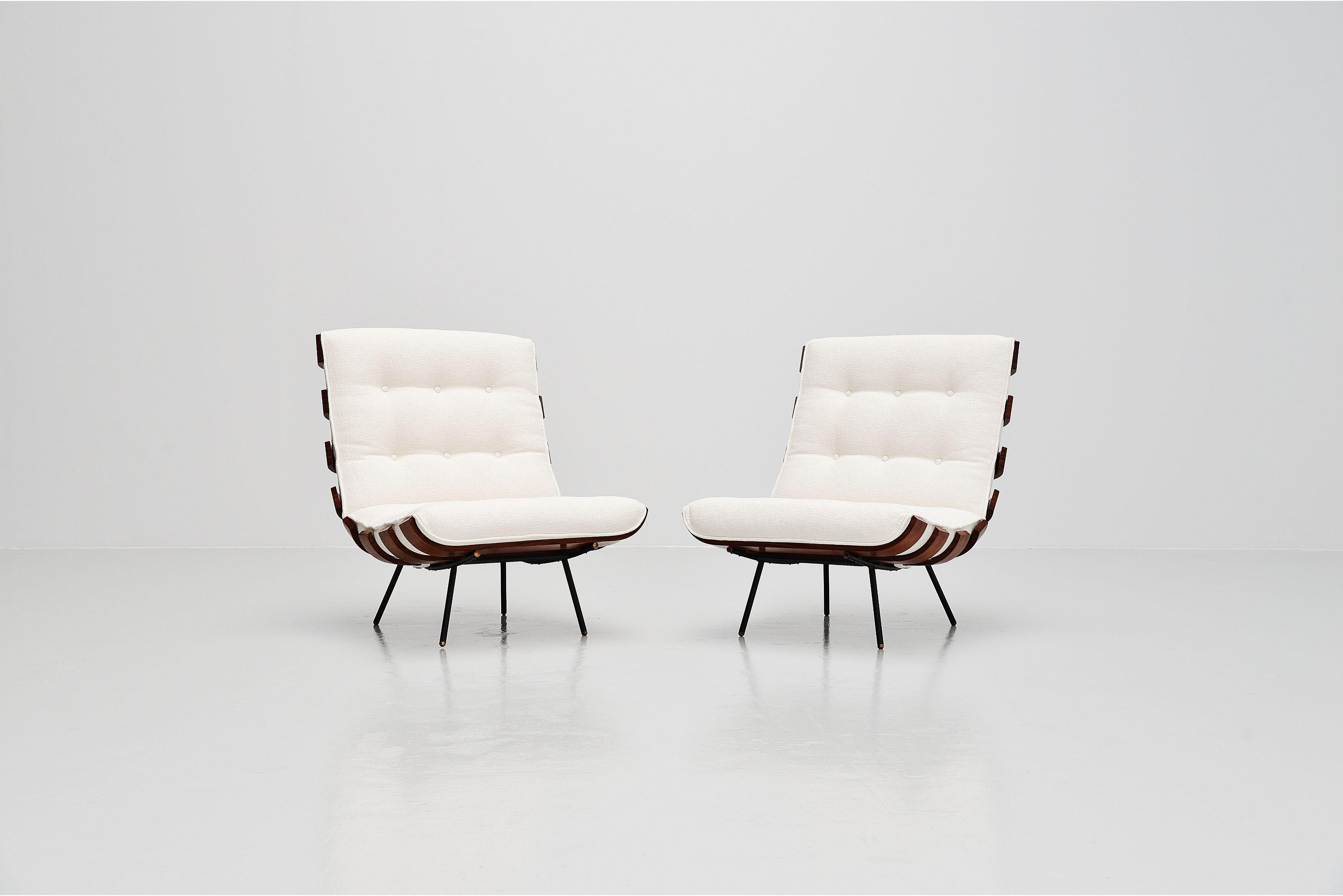Beautiful and iconic 'Costela' lounge chairs designed by Carlo Hauner and Martin Eisler and manufactured by Forma, Italy 1960. This is the European version of the Costela chairs, manufactured under license by Forma, Italy. These so called Costela