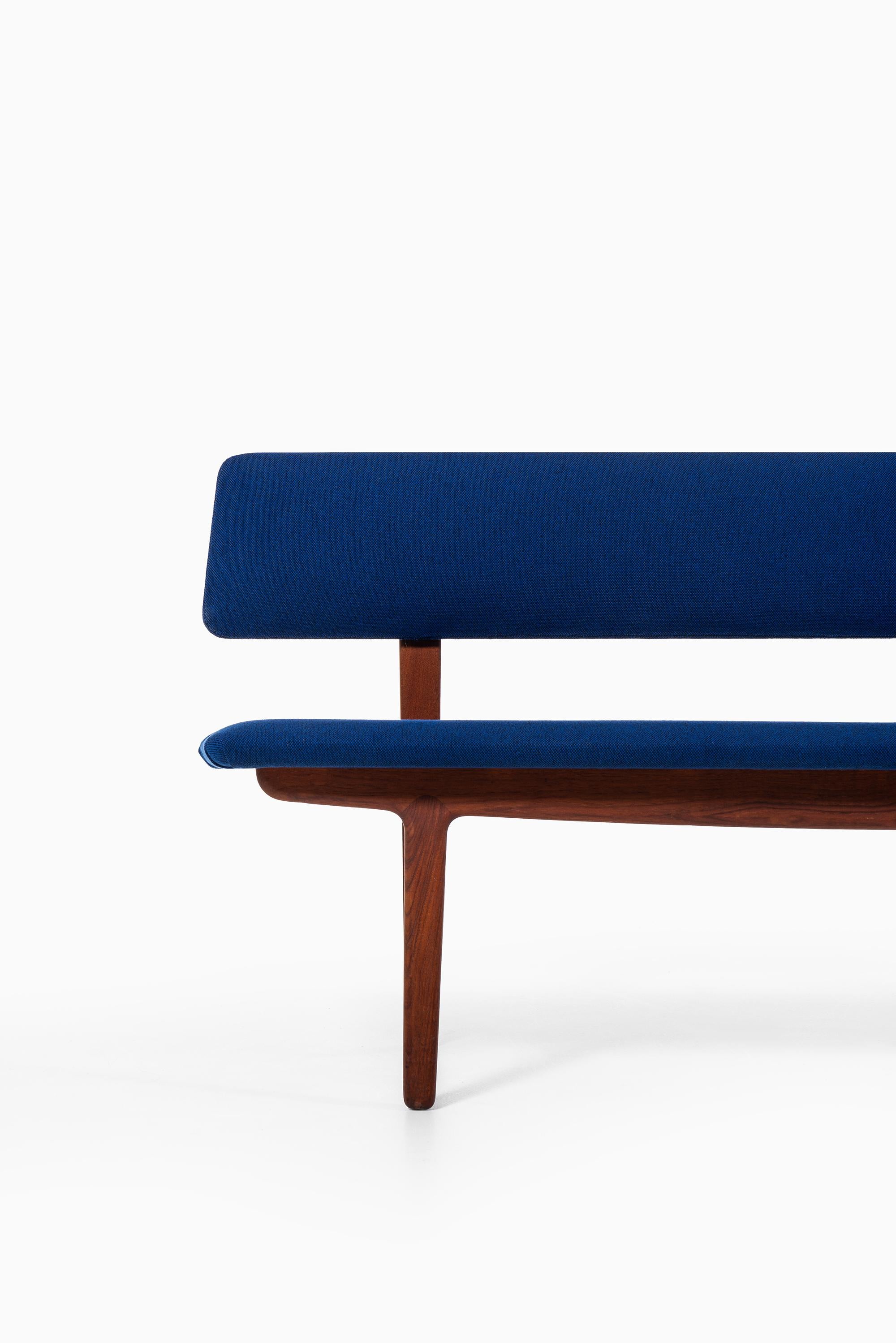 Rare bench or sofa designed by Ejnar Larsen & Aksel Bender Madsen. Produced by Næstved Møbler in Denmark.