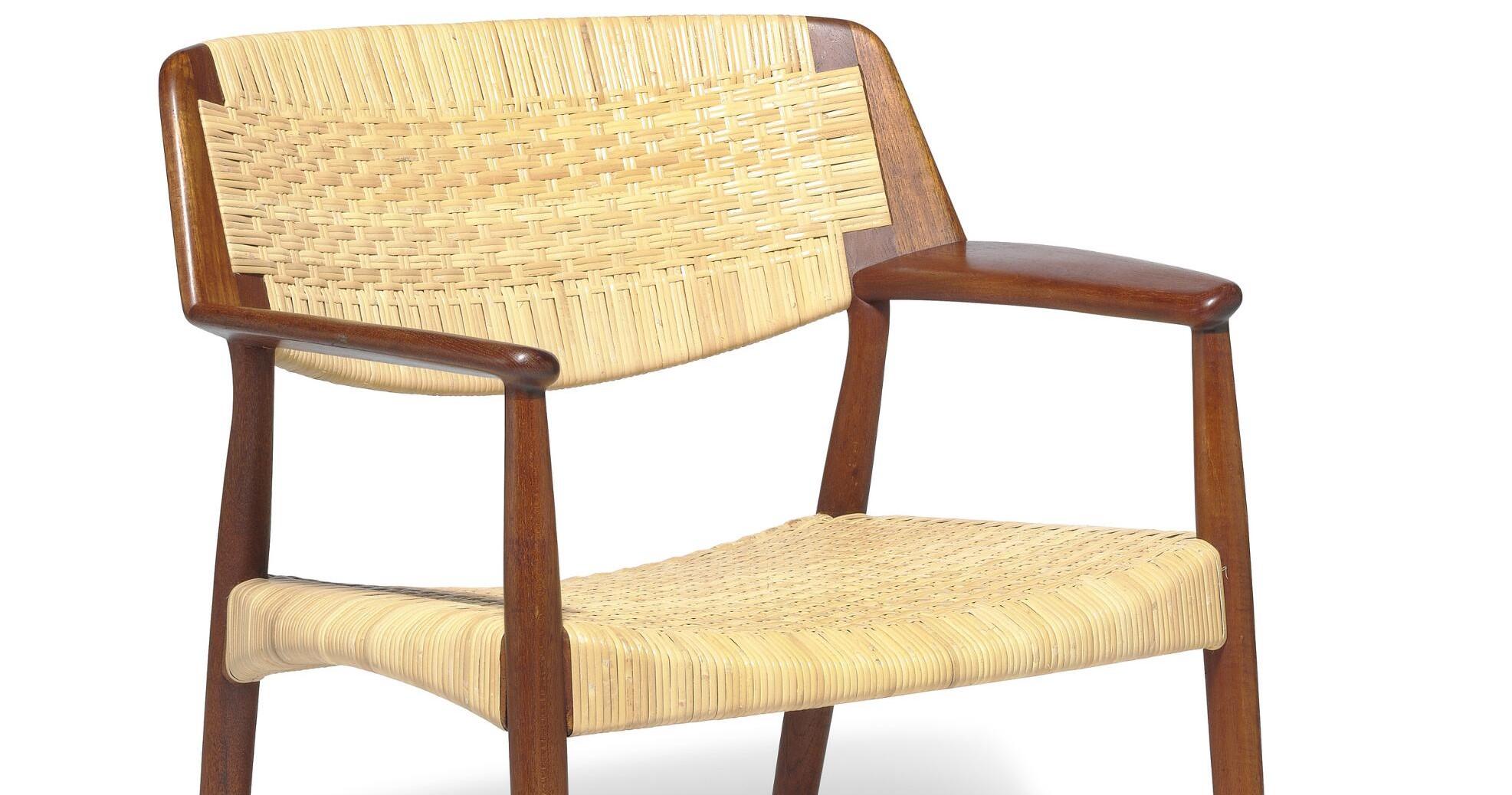 A rare teak armchair designed by Ejnar Larsen and Aksel Bender Madsen. Seat and back with woven cane. Designed 1955. This example made 1950–1960s by cabinetmaker Willy Beck.

Literature: Christian Holmsted Olesen, “Mesterværker 100 års dansk