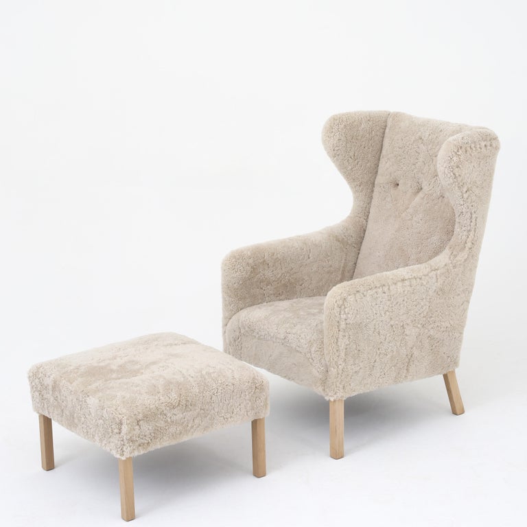 Ejnar Larsen Wing-Back Chair in New Lambswool with Beech Legs with Stool at  1stDibs