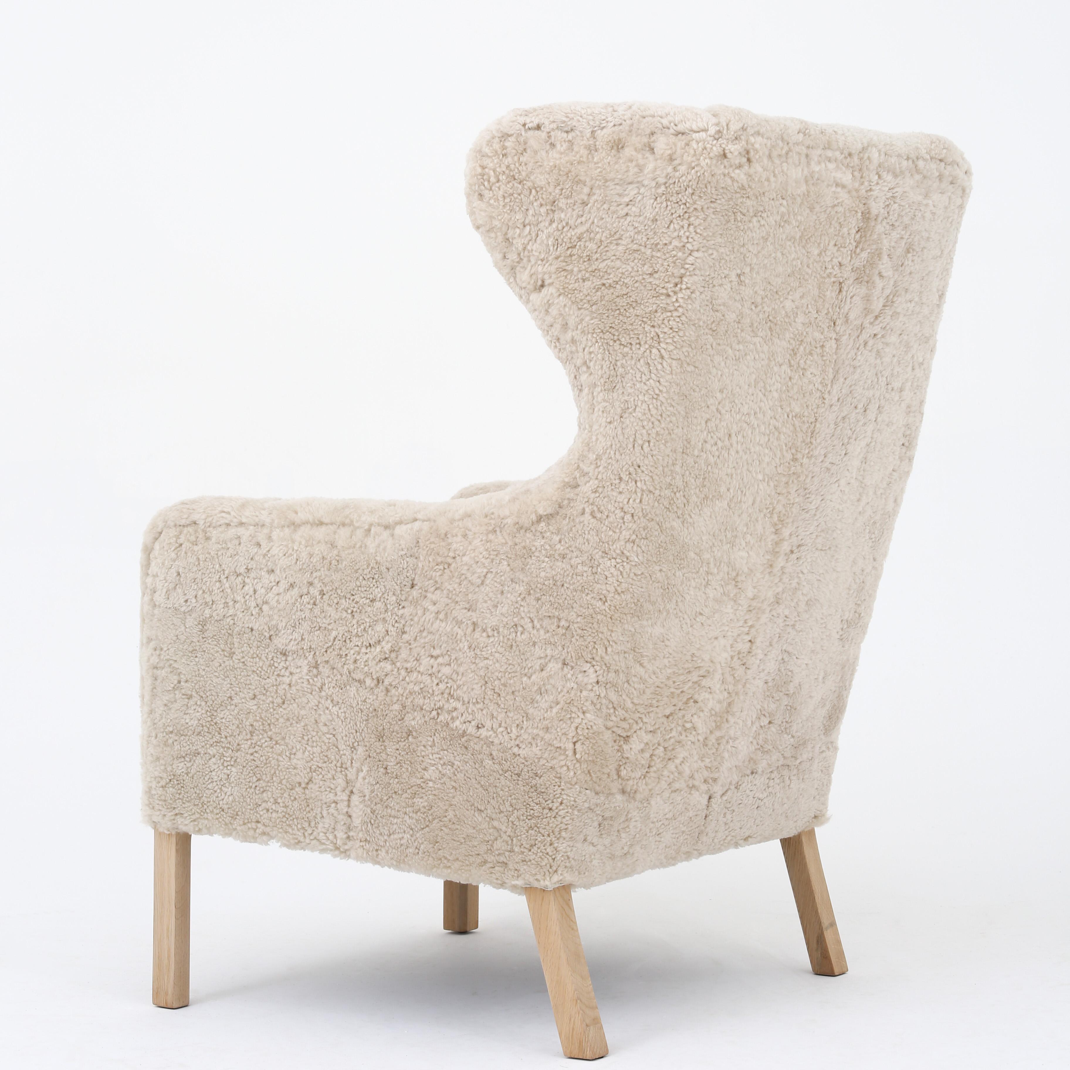 Danish Ejnar Larsen Wing-Back Chair in New Lambswool with Beech Legs with Stool