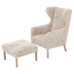 Ejnar Larsen Wing-Back Chair in New Lambswool with Beech Legs with Stool