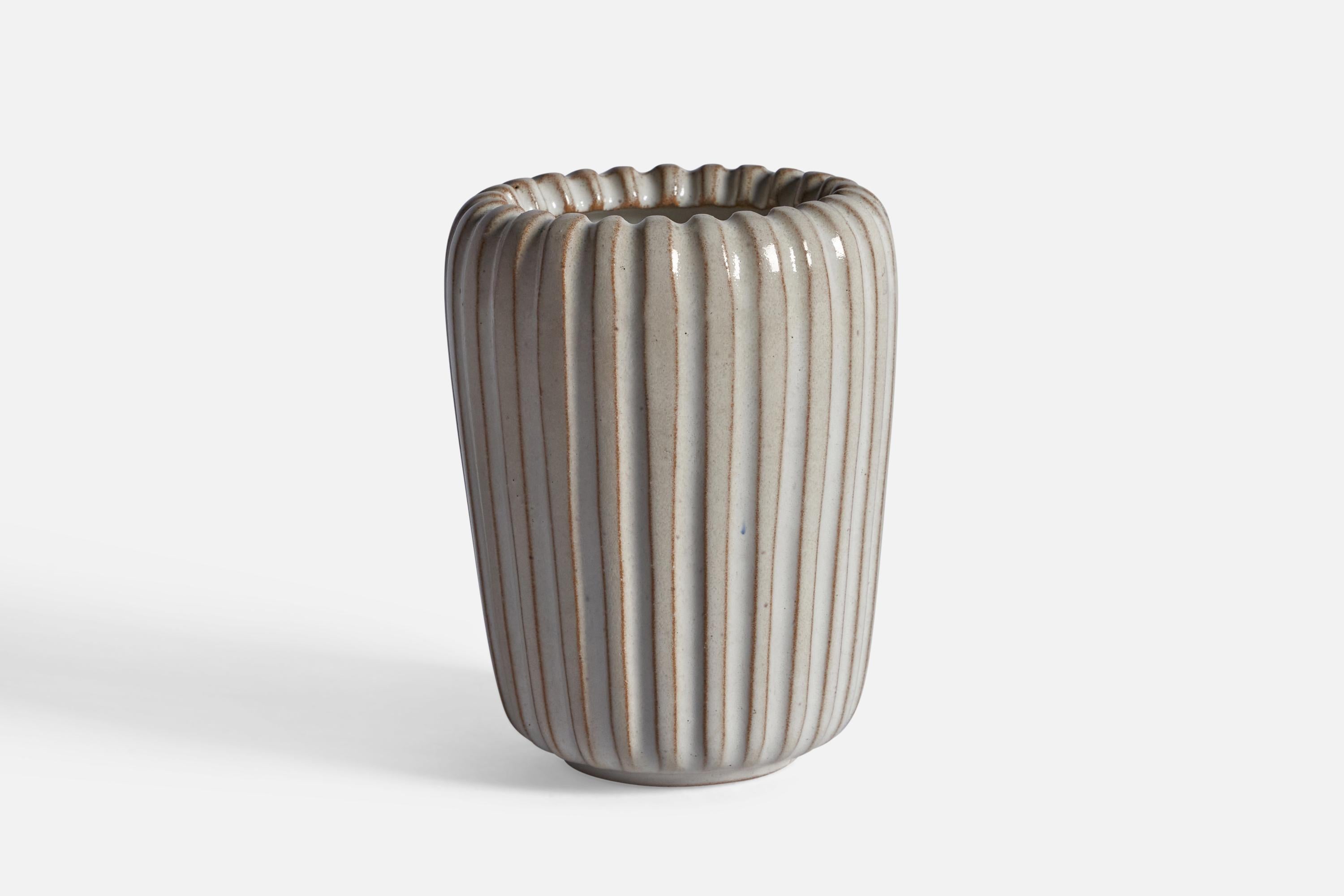 A fluted grey-glazed stoneware vase designed and produced by  Ejner Johansen, Denmark, c. 1960s.