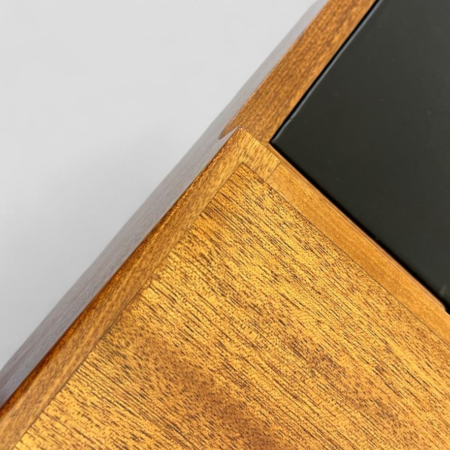 A rare freestanding Mahogany writing desk. Model 2084. Box-like top that folds out to reveal writing plate covered with original black leather. Under part of this storage compartment , also with “secret” room. Carved handles and brass fittings.