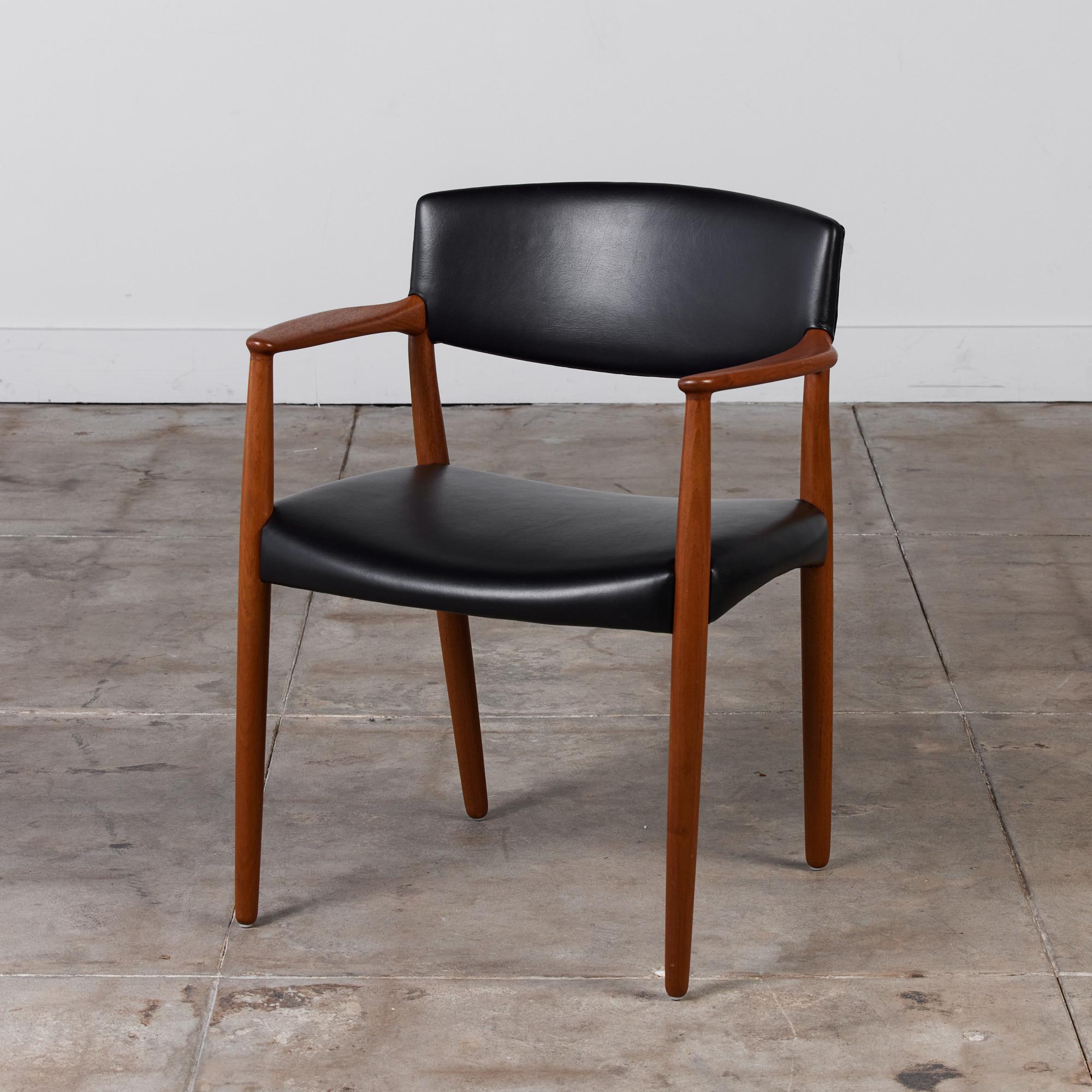 Rare armchair by Ejner Larsen & Aksel Bender Madsen for Willy Beck, c.1950s, Denmark. The chair features a solid teak frame and black leather upholstered wide seat and backrest.

Dimensions: 25