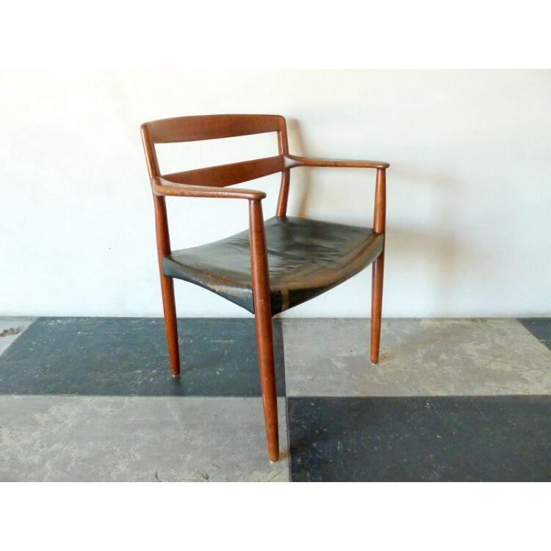 Ejner Larsen and Aksel Bender Madsen teak frame and black leather armchair, designed in 1956. Made by cabinetmaker Willy Beck, with maker's metal tag.

Overall Height: 31